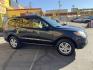 2011 Black /Gray Hyundai Santa Fe GL 2.4 4WD (5XYZGDAB3BG) with an 2.4L L4 DOHC 16V engine, 6-Speed Automatic transmission, located at 801 South State Street, Salt Lake City, UT, 84111, (801) 328-0098, 40.751953, -111.888206 - We put all 4 Brand new Tires! Clean title!!! Approved for up to a 5 year bumper warranty through Protective that can be added onto the vehicle. Great fuel economy this is a fuel efficient SUV at an affordable price hard to find. Features: 4WD/AWD, ABS Brakes, Air Conditioning, Alloy Wheels, AM/FM S - Photo#7
