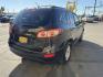 2011 Black /Gray Hyundai Santa Fe GL 2.4 4WD (5XYZGDAB3BG) with an 2.4L L4 DOHC 16V engine, 6-Speed Automatic transmission, located at 801 South State Street, Salt Lake City, UT, 84111, (801) 328-0098, 40.751953, -111.888206 - We put all 4 Brand new Tires! Clean title!!! Approved for up to a 5 year bumper warranty through Protective that can be added onto the vehicle. Great fuel economy this is a fuel efficient SUV at an affordable price hard to find. Features: 4WD/AWD, ABS Brakes, Air Conditioning, Alloy Wheels, AM/FM S - Photo#10