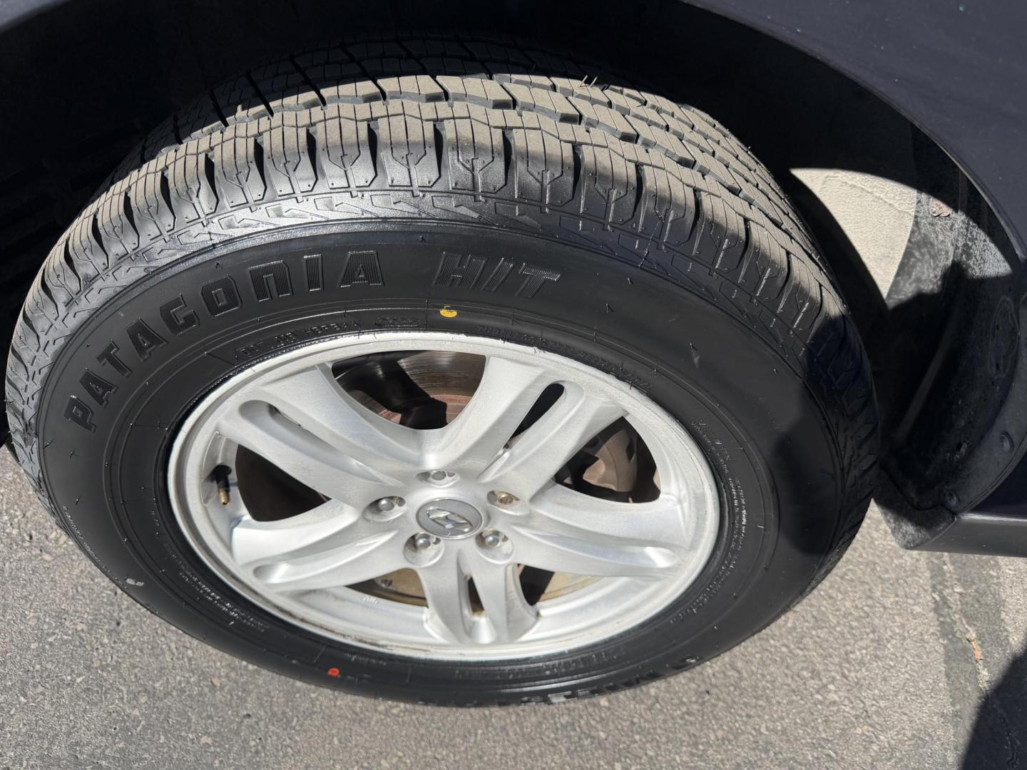 2011 Black /Gray Hyundai Santa Fe GL 2.4 4WD (5XYZGDAB3BG) with an 2.4L L4 DOHC 16V engine, 6-Speed Automatic transmission, located at 801 South State Street, Salt Lake City, UT, 84111, (801) 328-0098, 40.751953, -111.888206 - We put all 4 Brand new Tires! Clean title!!! Approved for up to a 5 year bumper warranty through Protective that can be added onto the vehicle. Great fuel economy this is a fuel efficient SUV at an affordable price hard to find. Features: 4WD/AWD, ABS Brakes, Air Conditioning, Alloy Wheels, AM/FM S - Photo#16