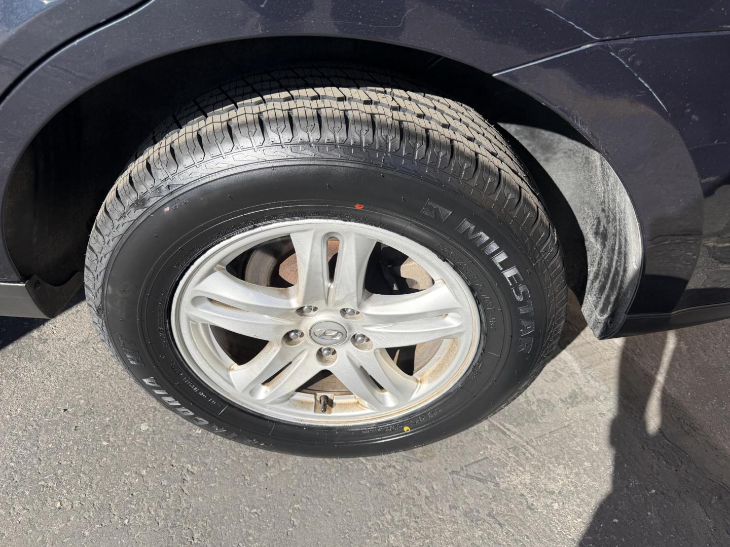 2011 Black /Gray Hyundai Santa Fe GL 2.4 4WD (5XYZGDAB3BG) with an 2.4L L4 DOHC 16V engine, 6-Speed Automatic transmission, located at 801 South State Street, Salt Lake City, UT, 84111, (801) 328-0098, 40.751953, -111.888206 - We put all 4 Brand new Tires! Clean title!!! Approved for up to a 5 year bumper warranty through Protective that can be added onto the vehicle. Great fuel economy this is a fuel efficient SUV at an affordable price hard to find. Features: 4WD/AWD, ABS Brakes, Air Conditioning, Alloy Wheels, AM/FM S - Photo#17