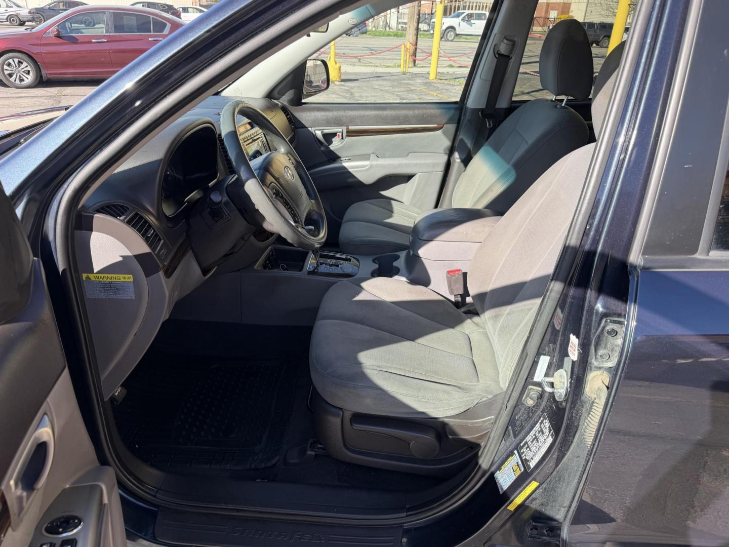 2011 Black /Gray Hyundai Santa Fe GL 2.4 4WD (5XYZGDAB3BG) with an 2.4L L4 DOHC 16V engine, 6-Speed Automatic transmission, located at 801 South State Street, Salt Lake City, UT, 84111, (801) 328-0098, 40.751953, -111.888206 - We put all 4 Brand new Tires! Clean title!!! Approved for up to a 5 year bumper warranty through Protective that can be added onto the vehicle. Great fuel economy this is a fuel efficient SUV at an affordable price hard to find. Features: 4WD/AWD, ABS Brakes, Air Conditioning, Alloy Wheels, AM/FM S - Photo#13