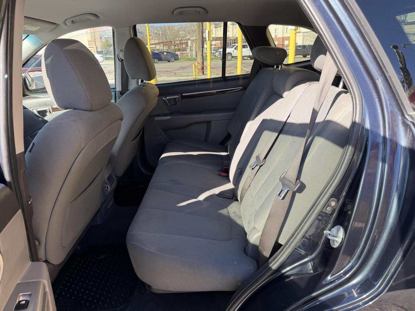 2011 Black /Gray Hyundai Santa Fe GL 2.4 4WD (5XYZGDAB3BG) with an 2.4L L4 DOHC 16V engine, 6-Speed Automatic transmission, located at 801 South State Street, Salt Lake City, UT, 84111, (801) 328-0098, 40.751953, -111.888206 - We put all 4 Brand new Tires! Clean title!!! Approved for up to a 5 year bumper warranty through Protective that can be added onto the vehicle. Great fuel economy this is a fuel efficient SUV at an affordable price hard to find. Features: 4WD/AWD, ABS Brakes, Air Conditioning, Alloy Wheels, AM/FM S - Photo#18