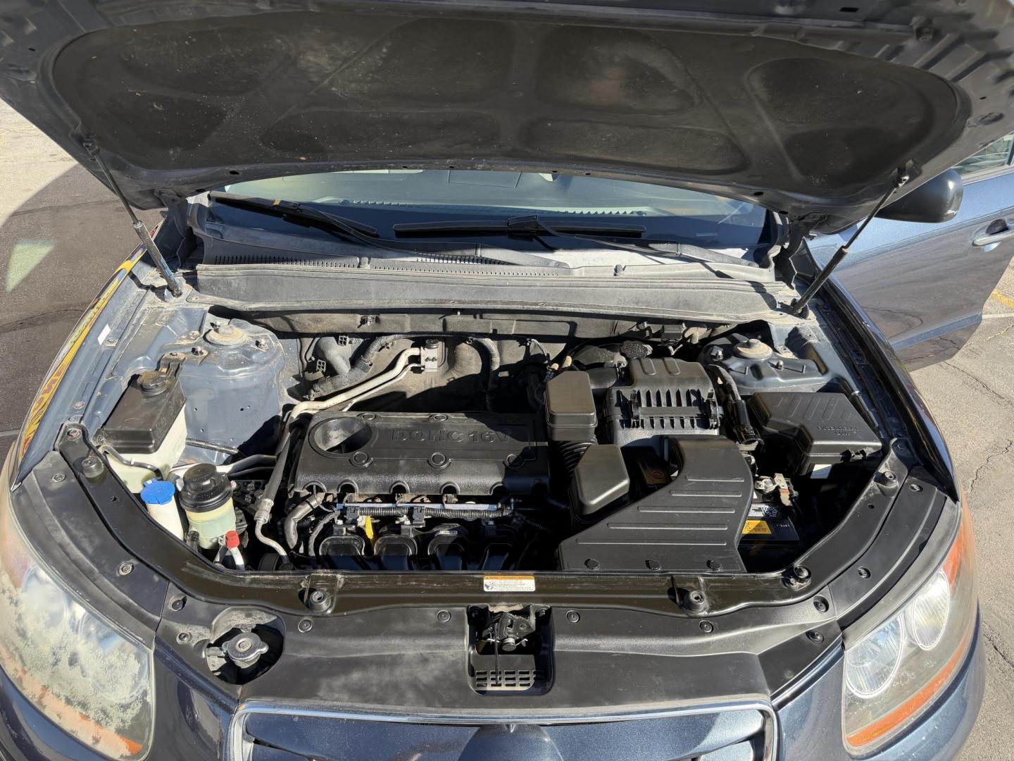 2011 Black /Gray Hyundai Santa Fe GL 2.4 4WD (5XYZGDAB3BG) with an 2.4L L4 DOHC 16V engine, 6-Speed Automatic transmission, located at 801 South State Street, Salt Lake City, UT, 84111, (801) 328-0098, 40.751953, -111.888206 - We put all 4 Brand new Tires! Clean title!!! Approved for up to a 5 year bumper warranty through Protective that can be added onto the vehicle. Great fuel economy this is a fuel efficient SUV at an affordable price hard to find. Features: 4WD/AWD, ABS Brakes, Air Conditioning, Alloy Wheels, AM/FM S - Photo#25