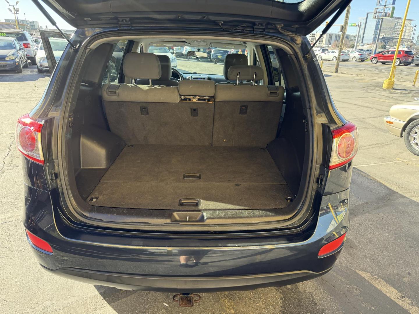 2011 Black /Gray Hyundai Santa Fe GL 2.4 4WD (5XYZGDAB3BG) with an 2.4L L4 DOHC 16V engine, 6-Speed Automatic transmission, located at 801 South State Street, Salt Lake City, UT, 84111, (801) 328-0098, 40.751953, -111.888206 - We put all 4 Brand new Tires! Clean title!!! Approved for up to a 5 year bumper warranty through Protective that can be added onto the vehicle. Great fuel economy this is a fuel efficient SUV at an affordable price hard to find. Features: 4WD/AWD, ABS Brakes, Air Conditioning, Alloy Wheels, AM/FM S - Photo#27