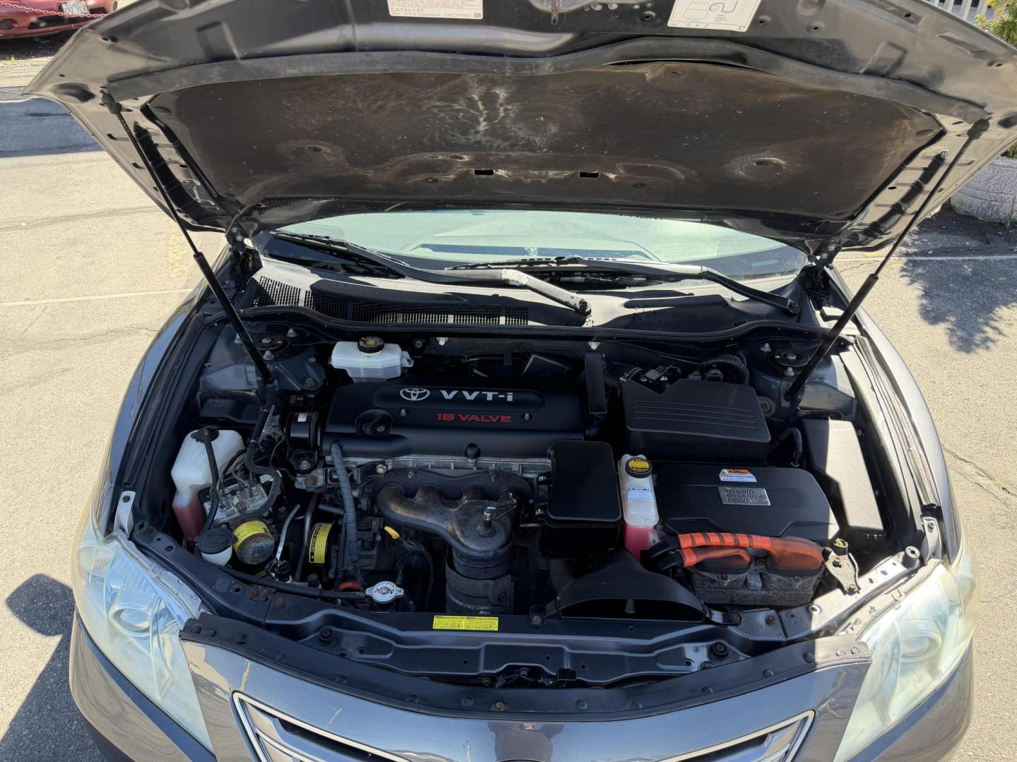 2007 Mineral Gray Metallic Toyota Camry Hybrid Sedan (4T1BB46K47U) with an 2.4L L4 DOHC 16V HYBRID engine, CVT transmission, located at 801 South State Street, Salt Lake City, UT, 84111, (801) 328-0098, 40.751953, -111.888206 - Clean title 2007 Toyota Camry Hybrid! Perfect Gas saver estimated 36–40 MPG City and highway around 34–38 MPG average is around 37 MPG!!! Only 2 previous owners on the Carfax. Really low miles for the year only 103,291 is really low for a 2007. This vehicle has been meticulously cared for and m - Photo#20