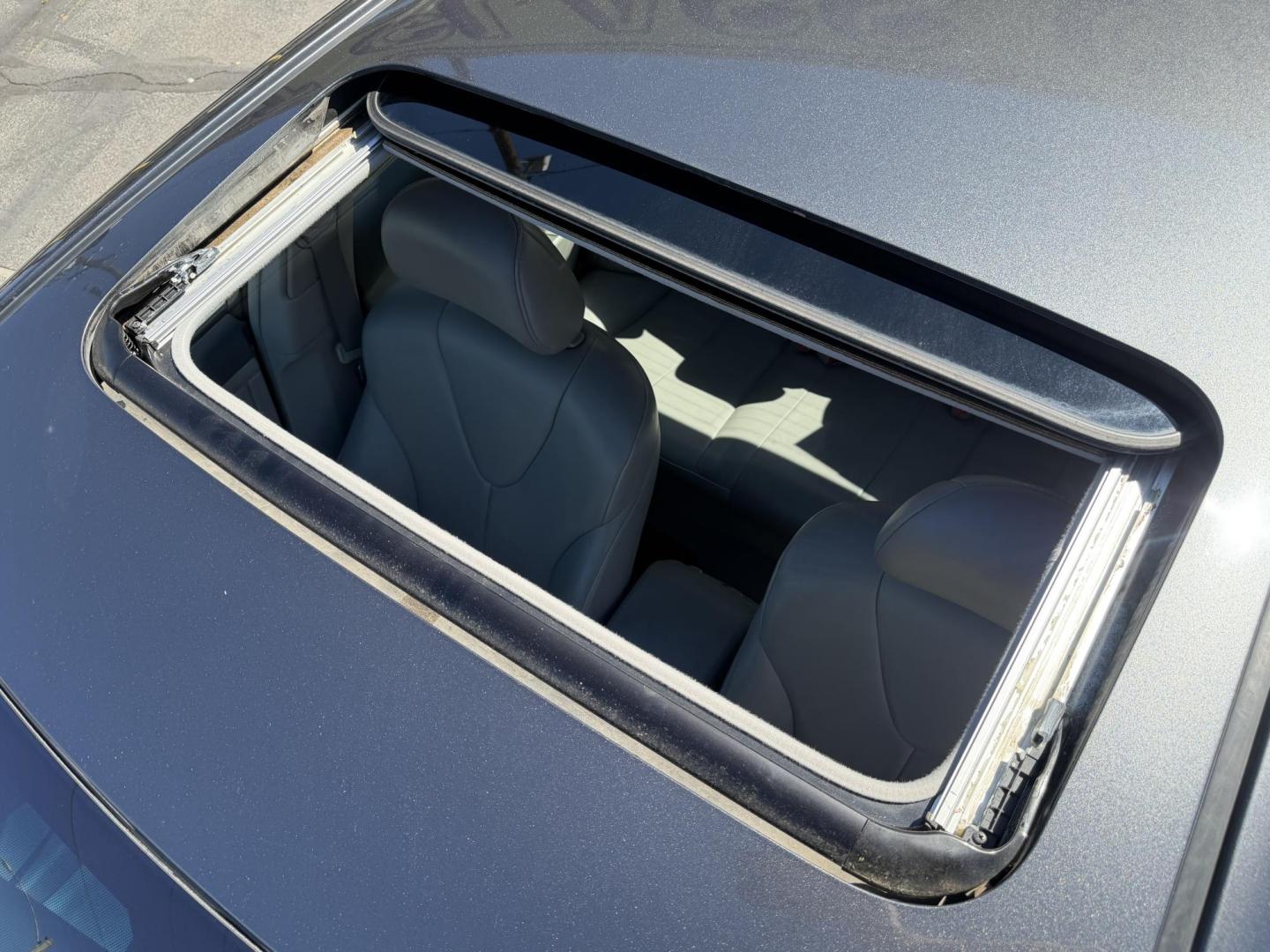 2007 Mineral Gray Metallic Toyota Camry Hybrid Sedan (4T1BB46K47U) with an 2.4L L4 DOHC 16V HYBRID engine, CVT transmission, located at 801 South State Street, Salt Lake City, UT, 84111, (801) 328-0098, 40.751953, -111.888206 - Clean title 2007 Toyota Camry Hybrid! Perfect Gas saver estimated 36–40 MPG City and highway around 34–38 MPG average is around 37 MPG!!! Only 2 previous owners on the Carfax. Really low miles for the year only 103,291 is really low for a 2007. This vehicle has been meticulously cared for and m - Photo#24