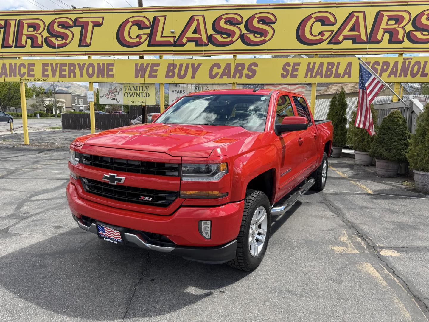 2016 Rallye Red /Black Chevrolet Silverado 1500 LT Crew Cab 4WD (3GCUKREC3GG) with an 5.3L V8 OHV 16V engine, 6A transmission, located at 801 South State Street, Salt Lake City, UT, 84111, (801) 328-0098, 40.751953, -111.888206 - Wow this one is Super Clean Carfax certified 1-owner. It is immaculate inside and out not a scratch on it. Excellent condition. This is a perfect truck for anyone looking for a clean affordable price range for a Silverado with the Offroad Z71 package. This truck has been checked out by a certified m - Photo#2