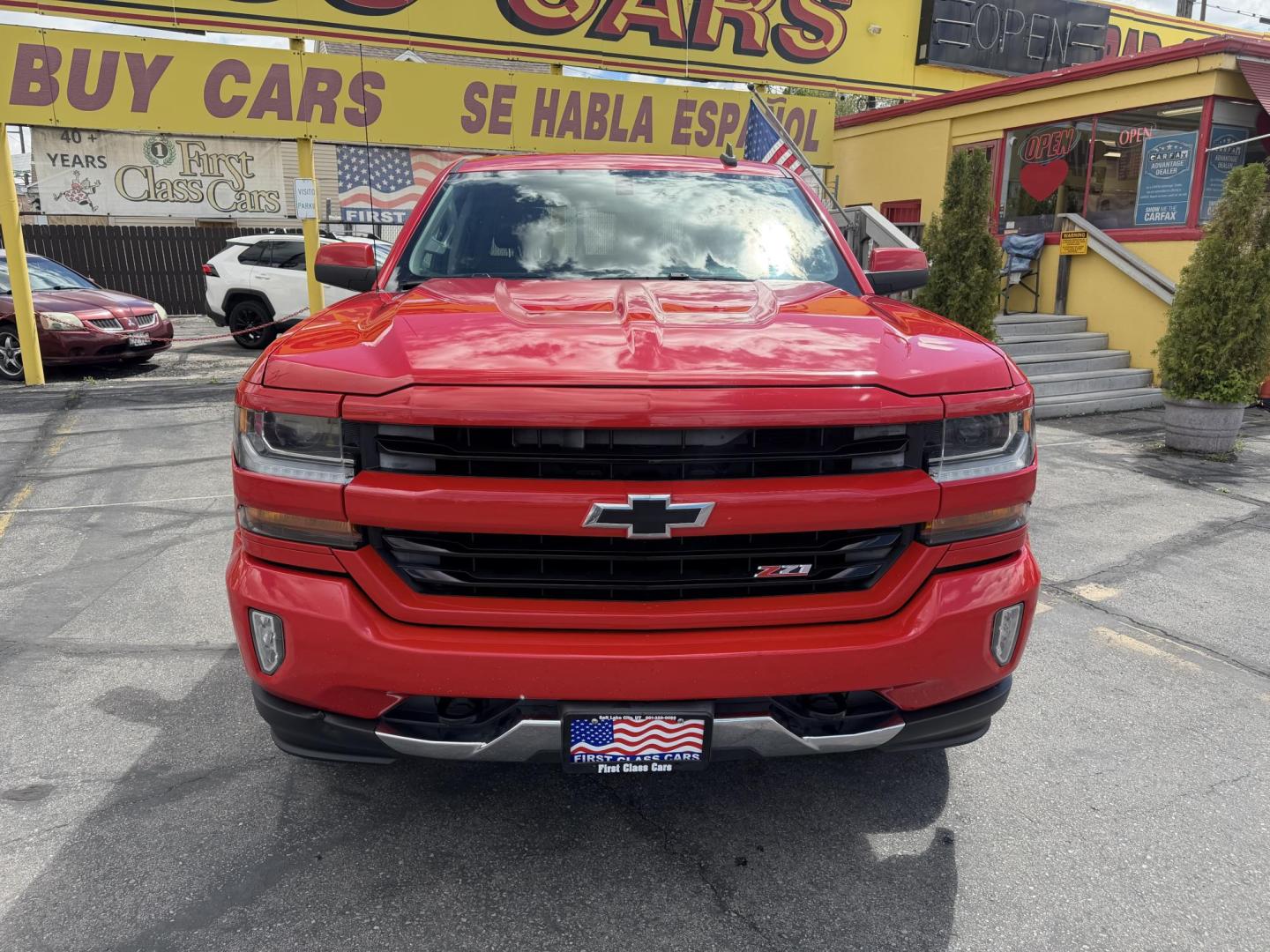 2016 Rallye Red /Black Chevrolet Silverado 1500 LT Crew Cab 4WD (3GCUKREC3GG) with an 5.3L V8 OHV 16V engine, 6A transmission, located at 801 South State Street, Salt Lake City, UT, 84111, (801) 328-0098, 40.751953, -111.888206 - Wow this one is Super Clean Carfax certified 1-owner. It is immaculate inside and out not a scratch on it. Excellent condition. This is a perfect truck for anyone looking for a clean affordable price range for a Silverado with the Offroad Z71 package. This truck has been checked out by a certified m - Photo#4