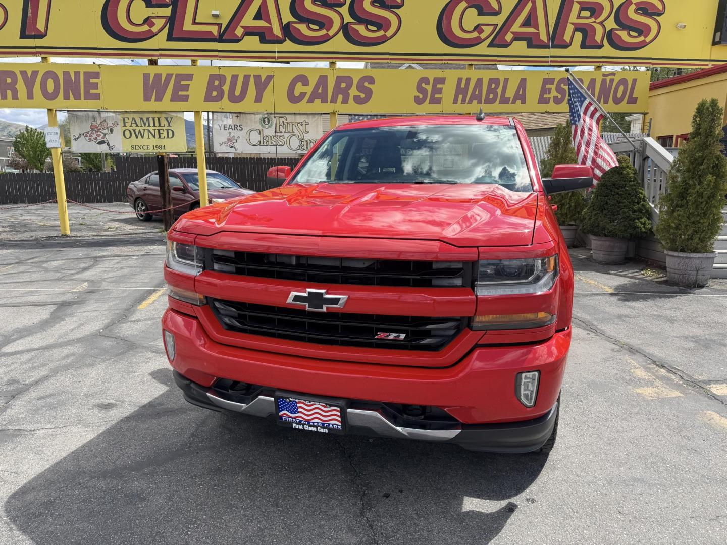 2016 Rallye Red /Black Chevrolet Silverado 1500 LT Crew Cab 4WD (3GCUKREC3GG) with an 5.3L V8 OHV 16V engine, 6A transmission, located at 801 South State Street, Salt Lake City, UT, 84111, (801) 328-0098, 40.751953, -111.888206 - Wow this one is Super Clean Carfax certified 1-owner. It is immaculate inside and out not a scratch on it. Excellent condition. This is a perfect truck for anyone looking for a clean affordable price range for a Silverado with the Offroad Z71 package. This truck has been checked out by a certified m - Photo#3