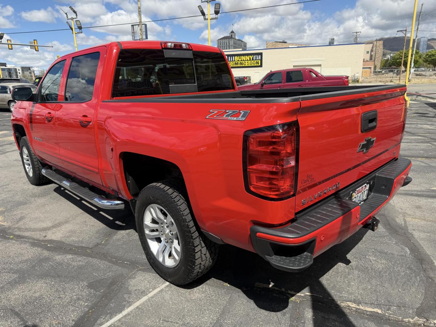 2016 Rallye Red /Black Chevrolet Silverado 1500 LT Crew Cab 4WD (3GCUKREC3GG) with an 5.3L V8 OHV 16V engine, 6A transmission, located at 801 South State Street, Salt Lake City, UT, 84111, (801) 328-0098, 40.751953, -111.888206 - Wow this one is Super Clean Carfax certified 1-owner. It is immaculate inside and out not a scratch on it. Excellent condition. This is a perfect truck for anyone looking for a clean affordable price range for a Silverado with the Offroad Z71 package. This truck has been checked out by a certified m - Photo#11