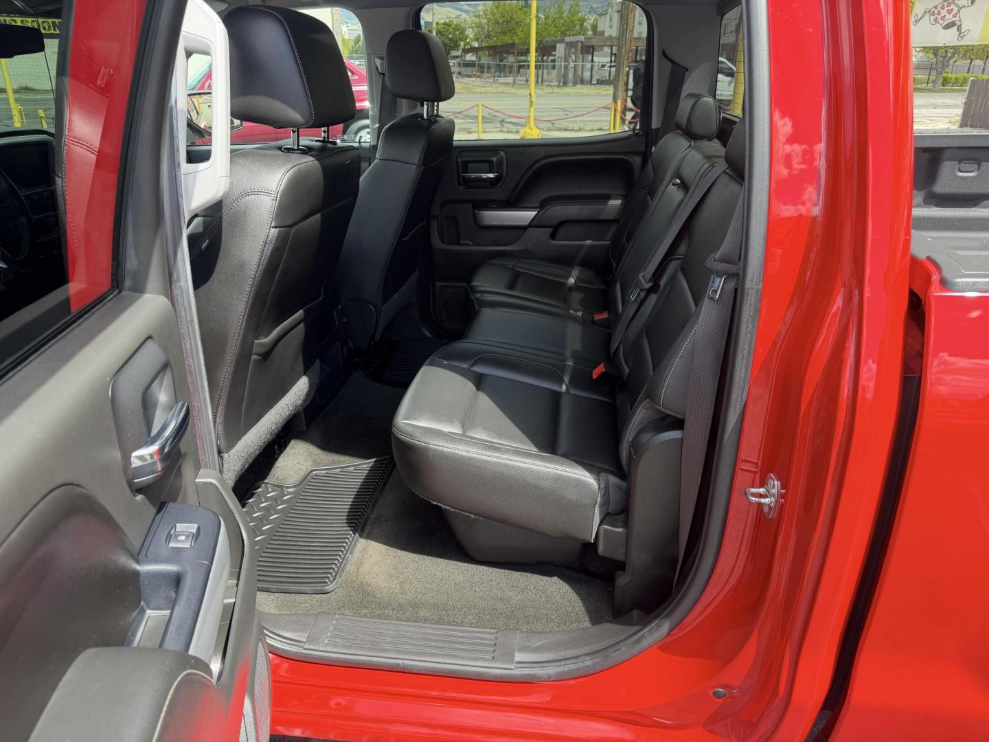 2016 Rallye Red /Black Chevrolet Silverado 1500 LT Crew Cab 4WD (3GCUKREC3GG) with an 5.3L V8 OHV 16V engine, 6A transmission, located at 801 South State Street, Salt Lake City, UT, 84111, (801) 328-0098, 40.751953, -111.888206 - Wow this one is Super Clean Carfax certified 1-owner. It is immaculate inside and out not a scratch on it. Excellent condition. This is a perfect truck for anyone looking for a clean affordable price range for a Silverado with the Offroad Z71 package. This truck has been checked out by a certified m - Photo#19