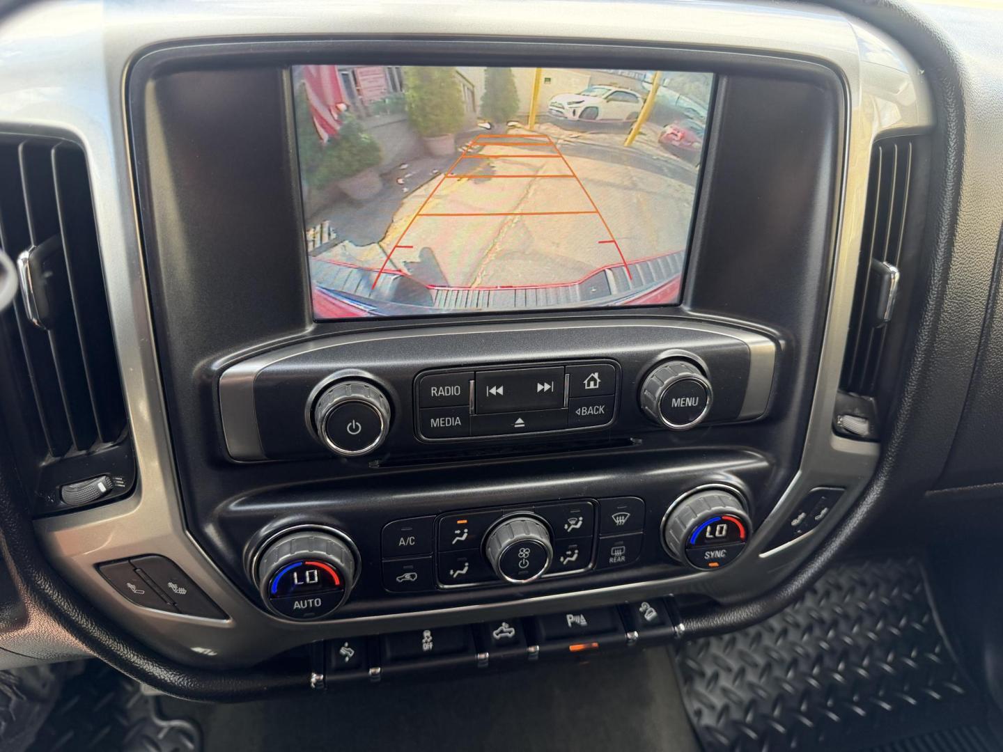 2016 Rallye Red /Black Chevrolet Silverado 1500 LT Crew Cab 4WD (3GCUKREC3GG) with an 5.3L V8 OHV 16V engine, 6A transmission, located at 801 South State Street, Salt Lake City, UT, 84111, (801) 328-0098, 40.751953, -111.888206 - Wow this one is Super Clean Carfax certified 1-owner. It is immaculate inside and out not a scratch on it. Excellent condition. This is a perfect truck for anyone looking for a clean affordable price range for a Silverado with the Offroad Z71 package. This truck has been checked out by a certified m - Photo#29