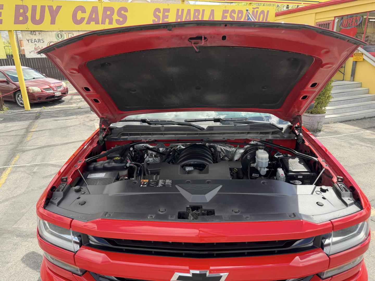 2016 Rallye Red /Black Chevrolet Silverado 1500 LT Crew Cab 4WD (3GCUKREC3GG) with an 5.3L V8 OHV 16V engine, 6A transmission, located at 801 South State Street, Salt Lake City, UT, 84111, (801) 328-0098, 40.751953, -111.888206 - Wow this one is Super Clean Carfax certified 1-owner. It is immaculate inside and out not a scratch on it. Excellent condition. This is a perfect truck for anyone looking for a clean affordable price range for a Silverado with the Offroad Z71 package. This truck has been checked out by a certified m - Photo#31
