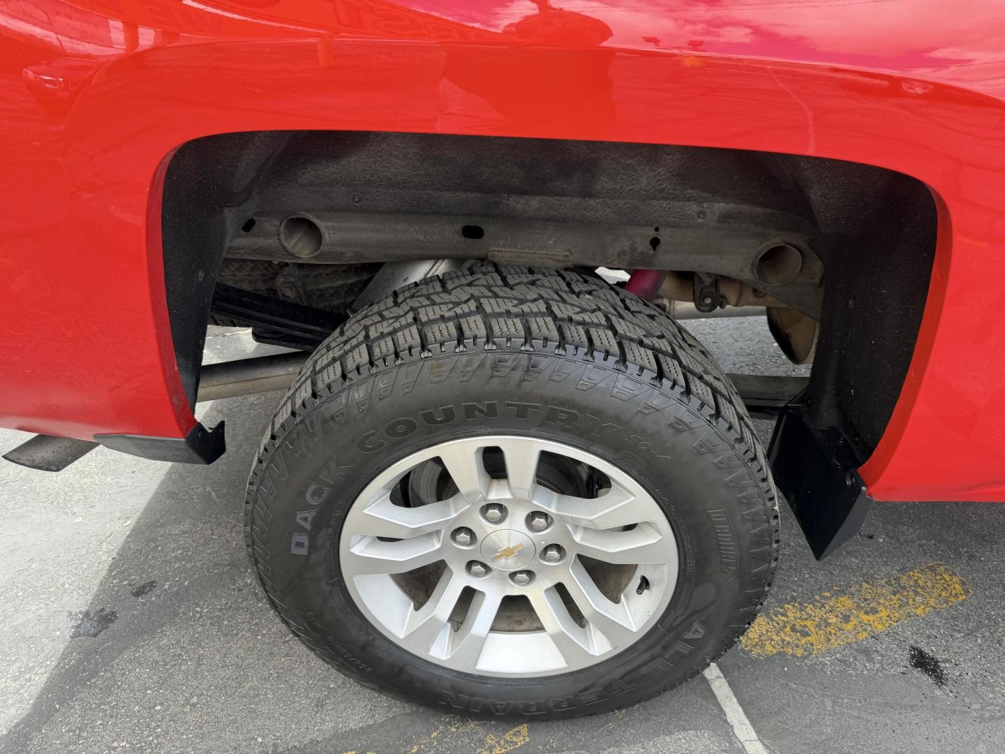2016 Rallye Red /Black Chevrolet Silverado 1500 LT Crew Cab 4WD (3GCUKREC3GG) with an 5.3L V8 OHV 16V engine, 6A transmission, located at 801 South State Street, Salt Lake City, UT, 84111, (801) 328-0098, 40.751953, -111.888206 - Wow this one is Super Clean Carfax certified 1-owner. It is immaculate inside and out not a scratch on it. Excellent condition. This is a perfect truck for anyone looking for a clean affordable price range for a Silverado with the Offroad Z71 package. This truck has been checked out by a certified m - Photo#35