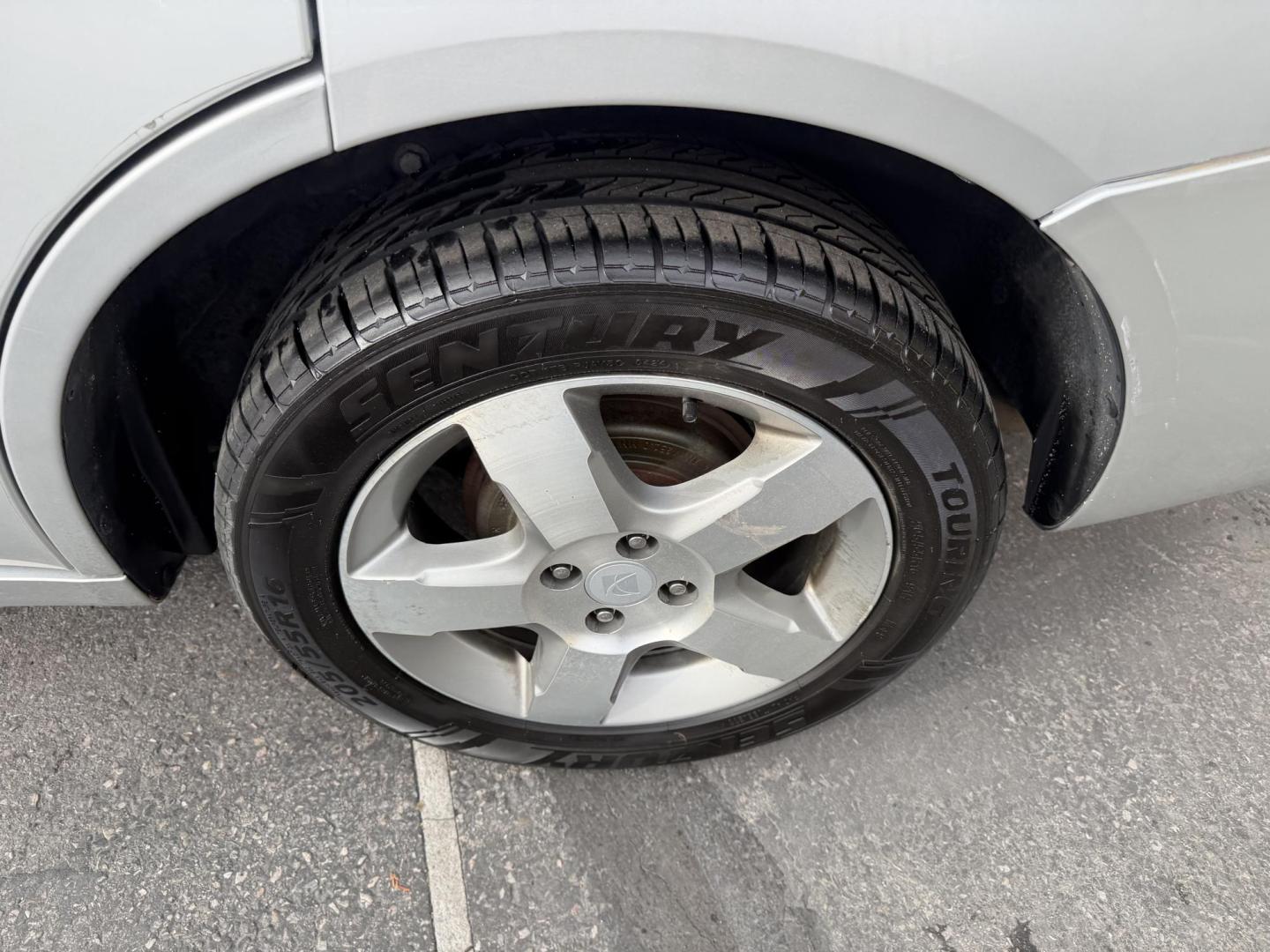 2007 Silver Sky Metallic /Gray Saturn ION 3 Sedan Automatic (1G8AL58B77Z) with an 2.4L L4 DOHC 16V engine, 4-Speed Automatic transmission, located at 801 South State Street, Salt Lake City, UT, 84111, (801) 328-0098, 40.751953, -111.888206 - Wow super low miles only 75,541 that is almost next to impossible to find on a 2007 these days. This was a 1-owner car that got traded in to a new car dealer the dealer that took it in on trade was reported as a new owner even though it wasn't because they issued the title in their name so really it - Photo#9