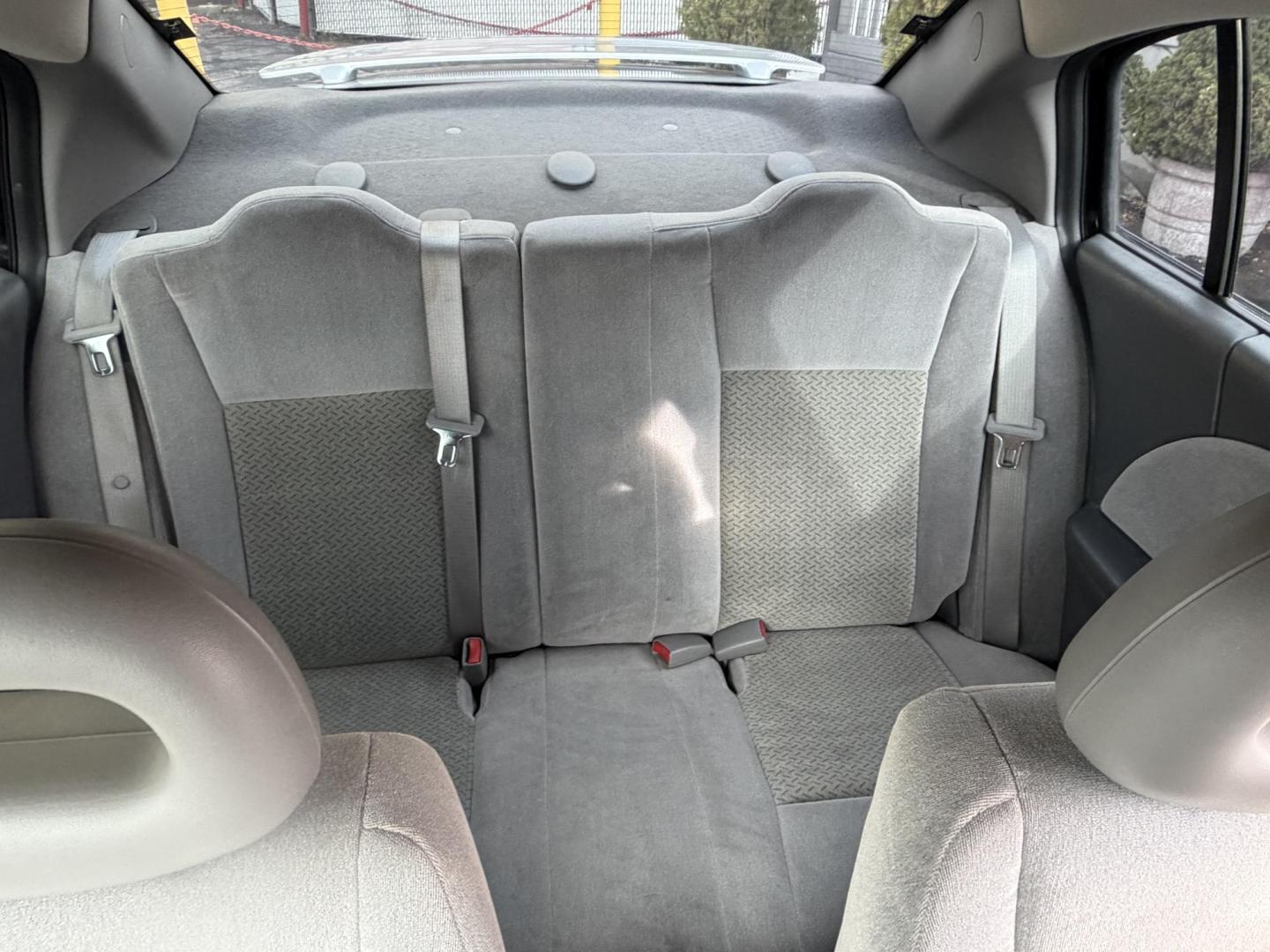 2007 Silver Sky Metallic /Gray Saturn ION 3 Sedan Automatic (1G8AL58B77Z) with an 2.4L L4 DOHC 16V engine, 4-Speed Automatic transmission, located at 801 South State Street, Salt Lake City, UT, 84111, (801) 328-0098, 40.751953, -111.888206 - Wow super low miles only 75,541 that is almost next to impossible to find on a 2007 these days. This was a 1-owner car that got traded in to a new car dealer the dealer that took it in on trade was reported as a new owner even though it wasn't because they issued the title in their name so really it - Photo#21