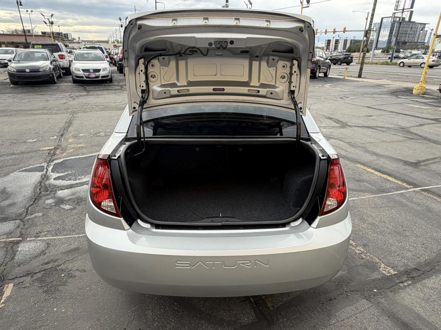 2007 Silver Sky Metallic /Gray Saturn ION 3 Sedan Automatic (1G8AL58B77Z) with an 2.4L L4 DOHC 16V engine, 4-Speed Automatic transmission, located at 801 South State Street, Salt Lake City, UT, 84111, (801) 328-0098, 40.751953, -111.888206 - Wow super low miles only 75,541 that is almost next to impossible to find on a 2007 these days. This was a 1-owner car that got traded in to a new car dealer the dealer that took it in on trade was reported as a new owner even though it wasn't because they issued the title in their name so really it - Photo#24