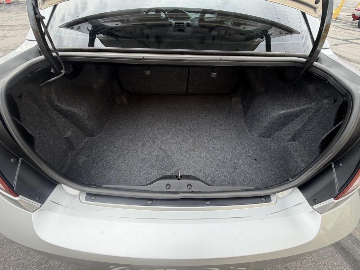 2007 Silver Sky Metallic /Gray Saturn ION 3 Sedan Automatic (1G8AL58B77Z) with an 2.4L L4 DOHC 16V engine, 4-Speed Automatic transmission, located at 801 South State Street, Salt Lake City, UT, 84111, (801) 328-0098, 40.751953, -111.888206 - Wow super low miles only 75,541 that is almost next to impossible to find on a 2007 these days. This was a 1-owner car that got traded in to a new car dealer the dealer that took it in on trade was reported as a new owner even though it wasn't because they issued the title in their name so really it - Photo#25