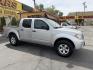 2013 Sunlight Silver Metallic /Gray Nissan Frontier SL Crew Cab 4WD (1N6AD0EV9DN) with an 4.0L V6 DOHC 24V engine, 5-Speed Automatic transmission, located at 801 South State Street, Salt Lake City, UT, 84111, (801) 328-0098, 40.751953, -111.888206 - Clean title! Carfax 2 owners only. Hard to find clean truck in excellent condition!!! Must see comes in 4x4 and showing regular service and maintenance was done on the Carfax! Approved for up to a 5 year warranty that can be purchased that covers bumper to bumper powertrain protection. Features: 4 - Photo#5