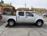 2013 Sunlight Silver Metallic /Gray Nissan Frontier SL Crew Cab 4WD (1N6AD0EV9DN) with an 4.0L V6 DOHC 24V engine, 5-Speed Automatic transmission, located at 801 South State Street, Salt Lake City, UT, 84111, (801) 328-0098, 40.751953, -111.888206 - Clean title! Carfax 2 owners only. Hard to find clean truck in excellent condition!!! Must see comes in 4x4 and showing regular service and maintenance was done on the Carfax! Approved for up to a 5 year warranty that can be purchased that covers bumper to bumper powertrain protection. Features: 4 - Photo#6