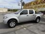 2013 Sunlight Silver Metallic /Gray Nissan Frontier SL Crew Cab 4WD (1N6AD0EV9DN) with an 4.0L V6 DOHC 24V engine, 5-Speed Automatic transmission, located at 801 South State Street, Salt Lake City, UT, 84111, (801) 328-0098, 40.751953, -111.888206 - Clean title! Carfax 2 owners only. Hard to find clean truck in excellent condition!!! Must see comes in 4x4 and showing regular service and maintenance was done on the Carfax! Approved for up to a 5 year warranty that can be purchased that covers bumper to bumper powertrain protection. Features: 4 - Photo#12