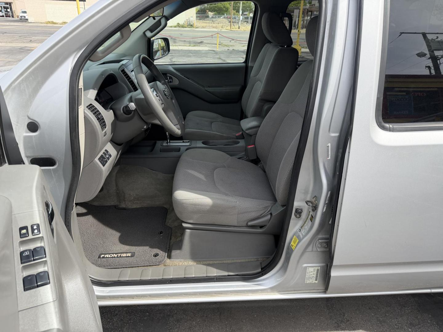 2013 Sunlight Silver Metallic /Gray Nissan Frontier SL Crew Cab 4WD (1N6AD0EV9DN) with an 4.0L V6 DOHC 24V engine, 5-Speed Automatic transmission, located at 801 South State Street, Salt Lake City, UT, 84111, (801) 328-0098, 40.751953, -111.888206 - Clean title! Carfax 2 owners only. Hard to find clean truck in excellent condition!!! Must see comes in 4x4 and showing regular service and maintenance was done on the Carfax! Approved for up to a 5 year warranty that can be purchased that covers bumper to bumper powertrain protection. Features: 4 - Photo#15