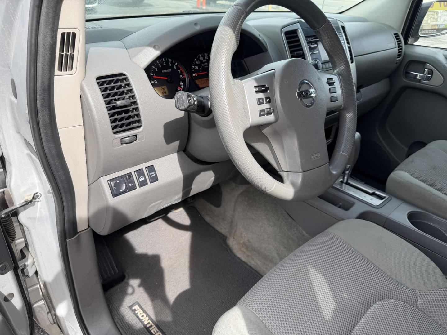 2013 Sunlight Silver Metallic /Gray Nissan Frontier SL Crew Cab 4WD (1N6AD0EV9DN) with an 4.0L V6 DOHC 24V engine, 5-Speed Automatic transmission, located at 801 South State Street, Salt Lake City, UT, 84111, (801) 328-0098, 40.751953, -111.888206 - Clean title! Carfax 2 owners only. Hard to find clean truck in excellent condition!!! Must see comes in 4x4 and showing regular service and maintenance was done on the Carfax! Approved for up to a 5 year warranty that can be purchased that covers bumper to bumper powertrain protection. Features: 4 - Photo#23