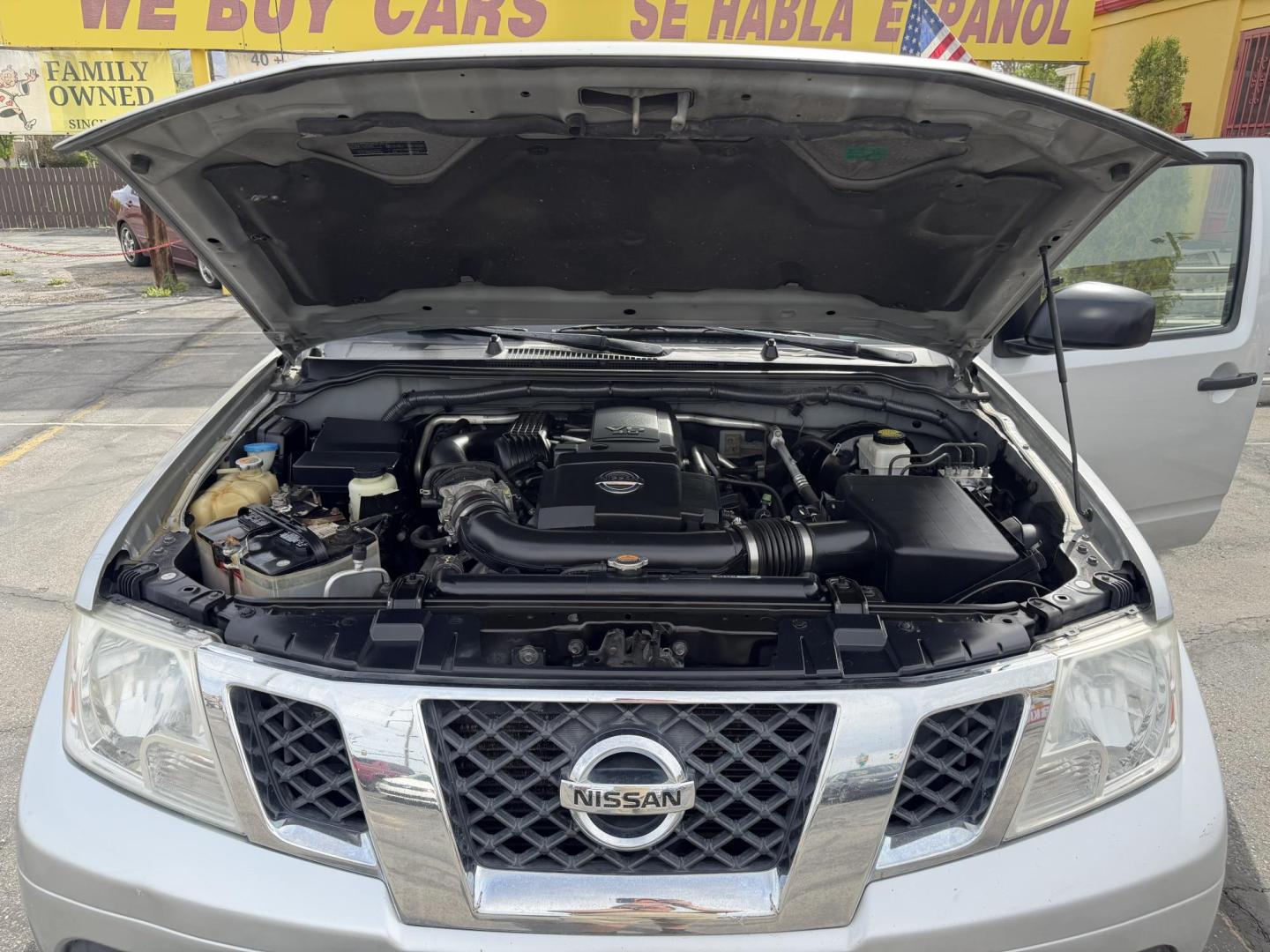 2013 Sunlight Silver Metallic /Gray Nissan Frontier SL Crew Cab 4WD (1N6AD0EV9DN) with an 4.0L V6 DOHC 24V engine, 5-Speed Automatic transmission, located at 801 South State Street, Salt Lake City, UT, 84111, (801) 328-0098, 40.751953, -111.888206 - Clean title! Carfax 2 owners only. Hard to find clean truck in excellent condition!!! Must see comes in 4x4 and showing regular service and maintenance was done on the Carfax! Approved for up to a 5 year warranty that can be purchased that covers bumper to bumper powertrain protection. Features: 4 - Photo#27