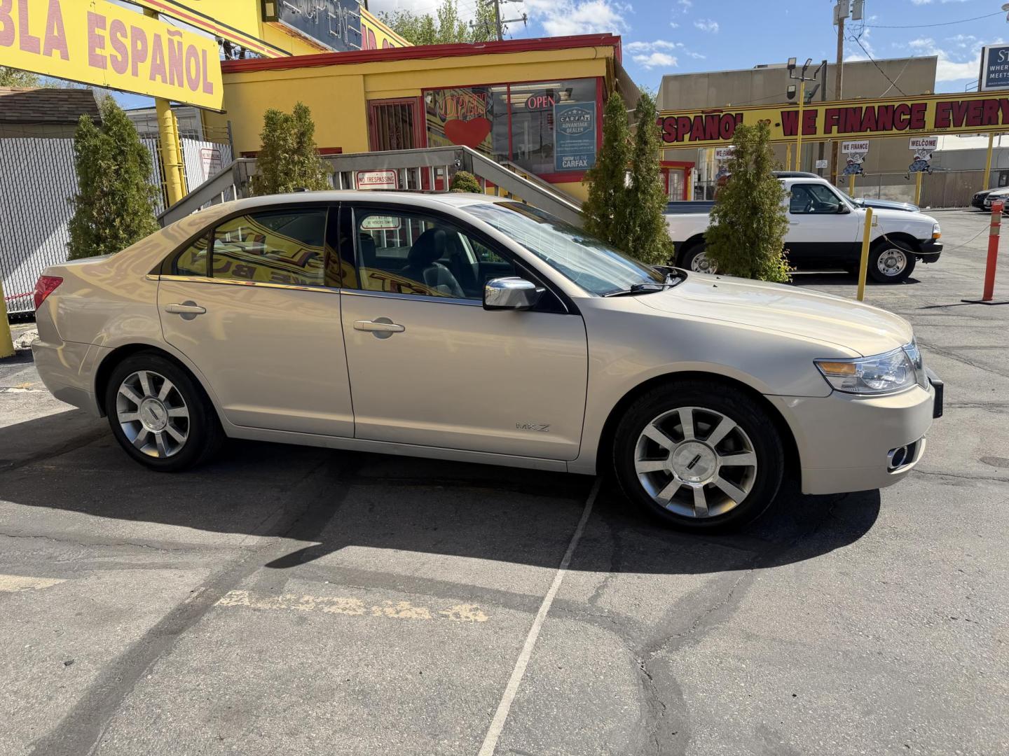 2009 Silver Sky Metallic /Black Lincoln MKZ FWD (3LNHM26T09R) with an 3.5L V6 DOHC 24V engine, 6-Speed Automatic transmission, located at 801 South State Street, Salt Lake City, UT, 84111, (801) 328-0098, 40.751953, -111.888206 - Clean title! No accidents on the Carfax report! Really super clean for the year hard to find this clean for the year! Only 2 previous owners reported on Carfax. Passed all inspections and has been approved for up to a 5 year warranty that can be added onto the sale. Super low miles also for the year - Photo#4