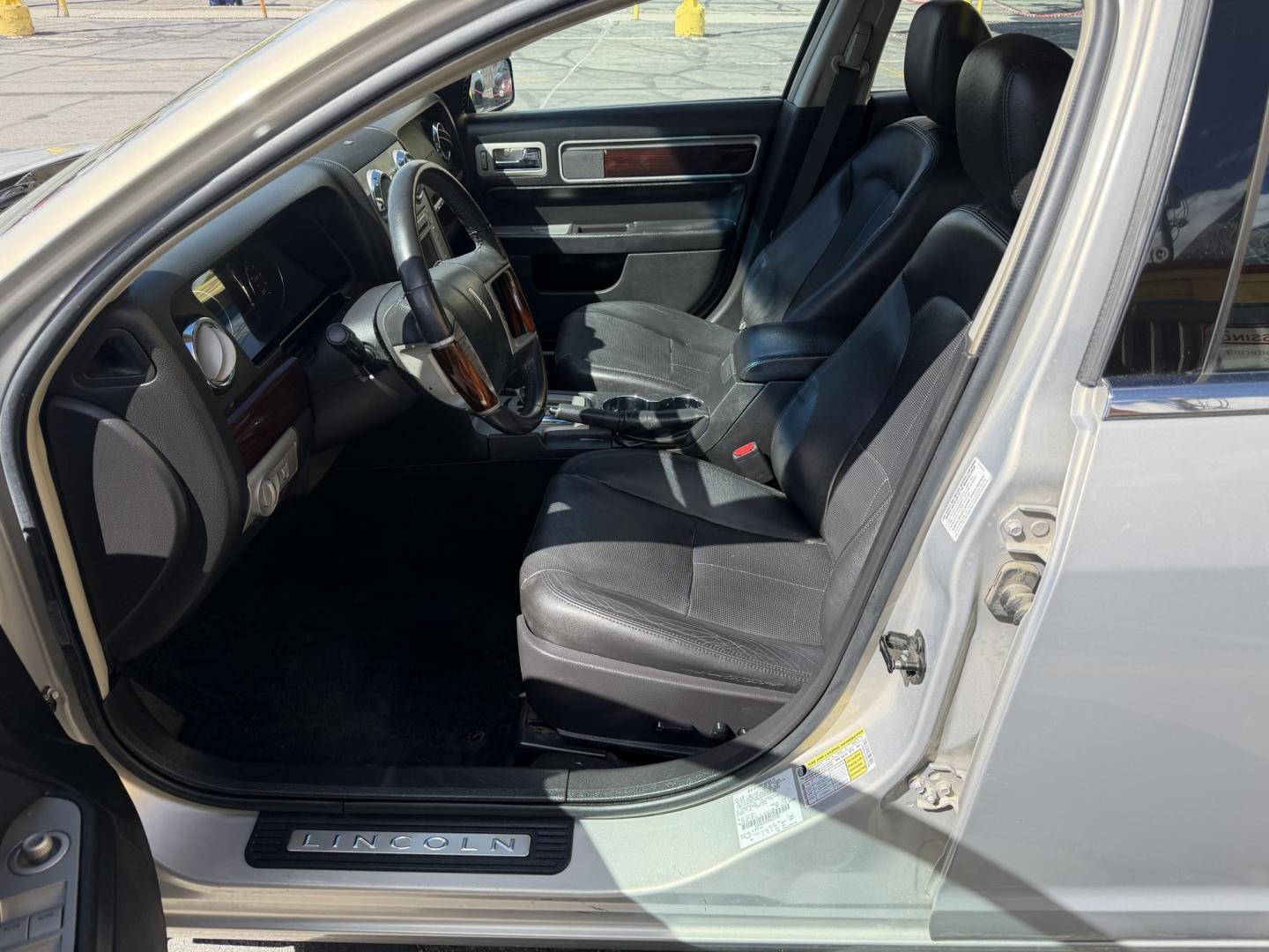 2009 Silver Sky Metallic /Black Lincoln MKZ FWD (3LNHM26T09R) with an 3.5L V6 DOHC 24V engine, 6-Speed Automatic transmission, located at 801 South State Street, Salt Lake City, UT, 84111, (801) 328-0098, 40.751953, -111.888206 - Clean title! No accidents on the Carfax report! Really super clean for the year hard to find this clean for the year! Only 2 previous owners reported on Carfax. Passed all inspections and has been approved for up to a 5 year warranty that can be added onto the sale. Super low miles also for the year - Photo#13