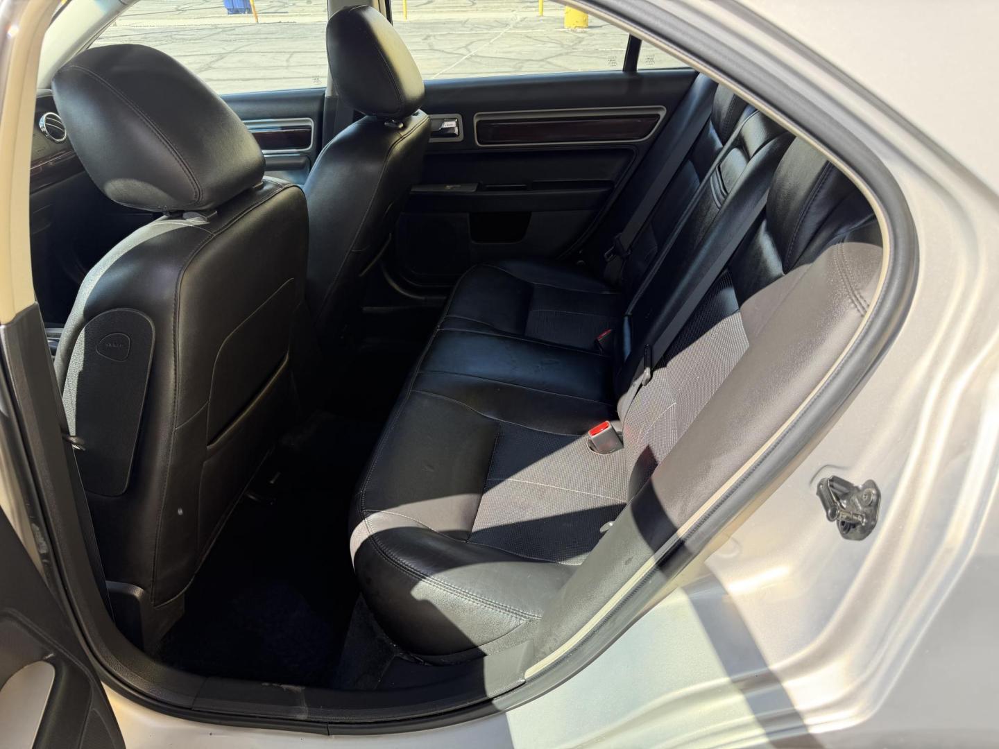 2009 Silver Sky Metallic /Black Lincoln MKZ FWD (3LNHM26T09R) with an 3.5L V6 DOHC 24V engine, 6-Speed Automatic transmission, located at 801 South State Street, Salt Lake City, UT, 84111, (801) 328-0098, 40.751953, -111.888206 - Clean title! No accidents on the Carfax report! Really super clean for the year hard to find this clean for the year! Only 2 previous owners reported on Carfax. Passed all inspections and has been approved for up to a 5 year warranty that can be added onto the sale. Super low miles also for the year - Photo#14