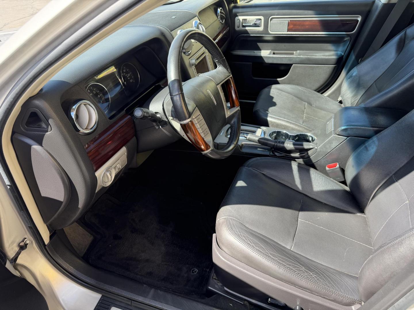 2009 Silver Sky Metallic /Black Lincoln MKZ FWD (3LNHM26T09R) with an 3.5L V6 DOHC 24V engine, 6-Speed Automatic transmission, located at 801 South State Street, Salt Lake City, UT, 84111, (801) 328-0098, 40.751953, -111.888206 - Clean title! No accidents on the Carfax report! Really super clean for the year hard to find this clean for the year! Only 2 previous owners reported on Carfax. Passed all inspections and has been approved for up to a 5 year warranty that can be added onto the sale. Super low miles also for the year - Photo#22