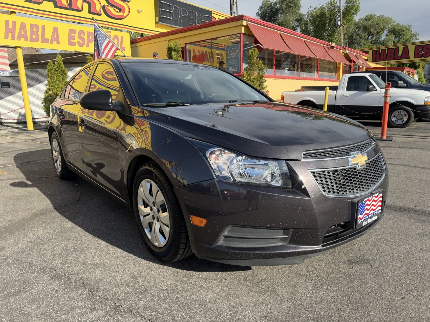 2014 Black /Black Chevrolet Cruze LS Auto (1G1PA5SG9E7) with an 1.8L L4 DOHC 16V engine, 6-Speed Automatic transmission, located at 801 South State Street, Salt Lake City, UT, 84111, (801) 328-0098, 40.751953, -111.888206 - Wow real nice Chevrolet Cruze hard to find with these low miles! Clean title! Great condition this one is a must see for anyone looking for a clean Chevrolet Cruze. Has been meticulously maintained and cared for Carfax shows all the regular service was done and maintained very well! Has passed all i - Photo#4