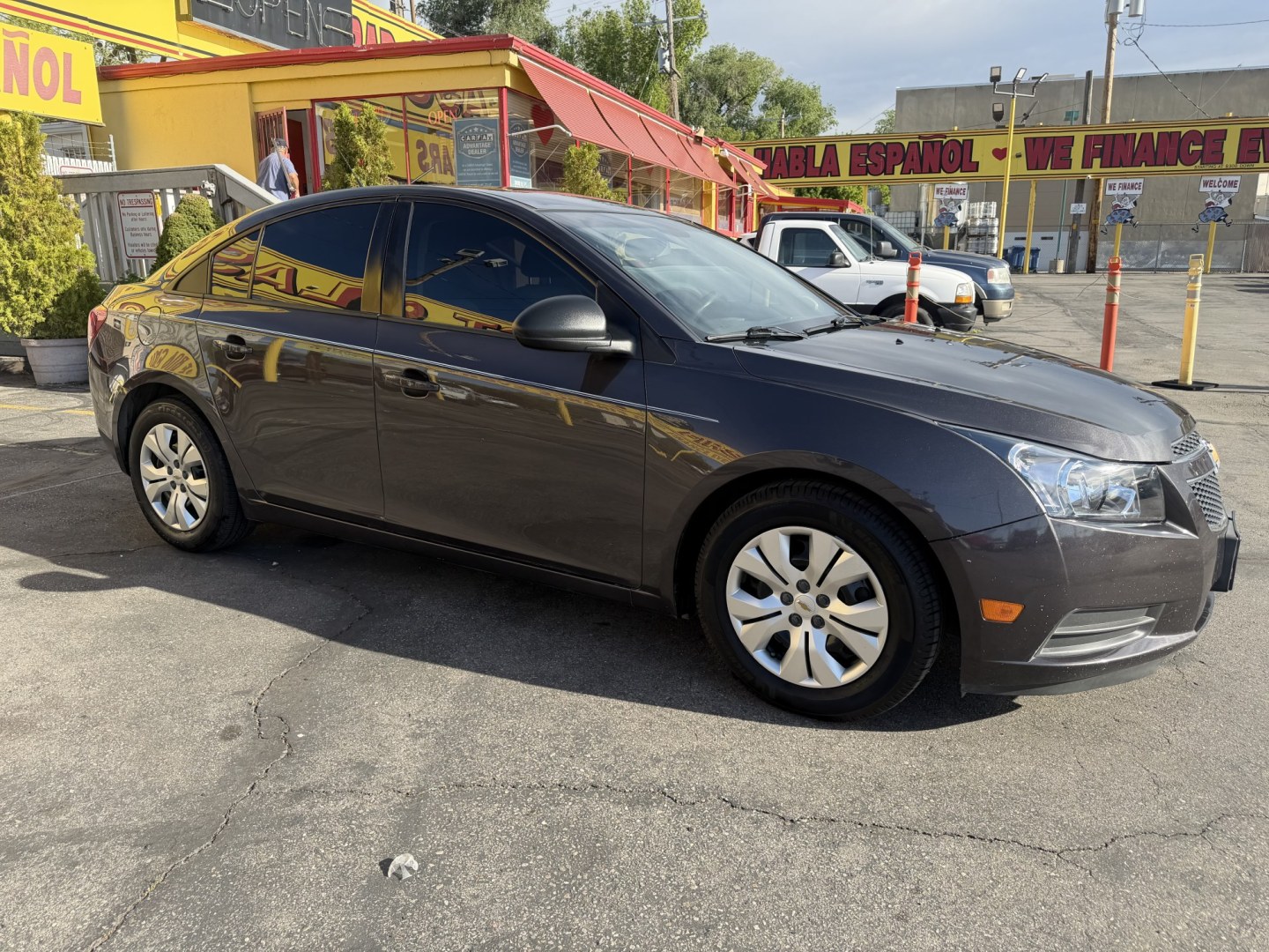 2014 Black /Black Chevrolet Cruze LS Auto (1G1PA5SG9E7) with an 1.8L L4 DOHC 16V engine, 6-Speed Automatic transmission, located at 801 South State Street, Salt Lake City, UT, 84111, (801) 328-0098, 40.751953, -111.888206 - Wow real nice Chevrolet Cruze hard to find with these low miles! Clean title! Great condition this one is a must see for anyone looking for a clean Chevrolet Cruze. Has been meticulously maintained and cared for Carfax shows all the regular service was done and maintained very well! Has passed all i - Photo#5