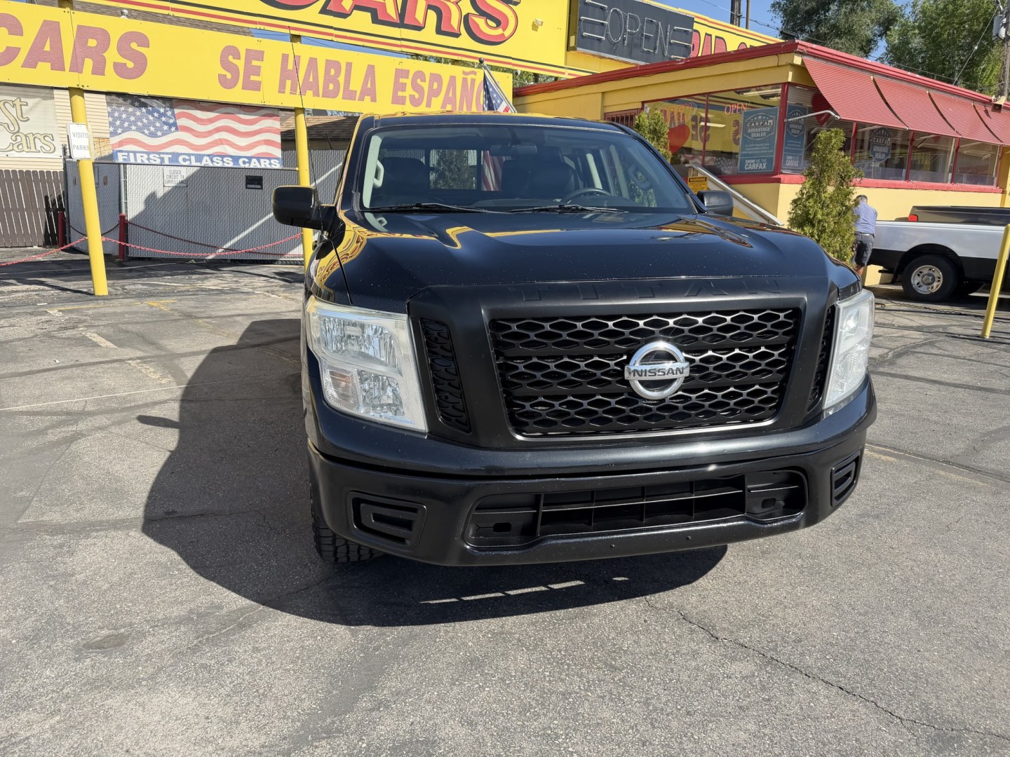 2017 Black /Black Nissan Titan S Crew Cab 4WD (1N6AA1EJ4HN) with an 5.6L V8 DOHC 32V engine, 6A transmission, located at 801 South State Street, Salt Lake City, UT, 84111, (801) 328-0098, 40.751953, -111.888206 - Clean title! Only 2 previous owners reported on the Carfax history report! This is a must see for anyone looking for a nice truck! Approved for up to a 5 year extended warranty! Come in today or call 801-328-0098 to schedule an appointment to take a look at it! Features: 4WD/AWD, ABS Brakes, Air C - Photo#4