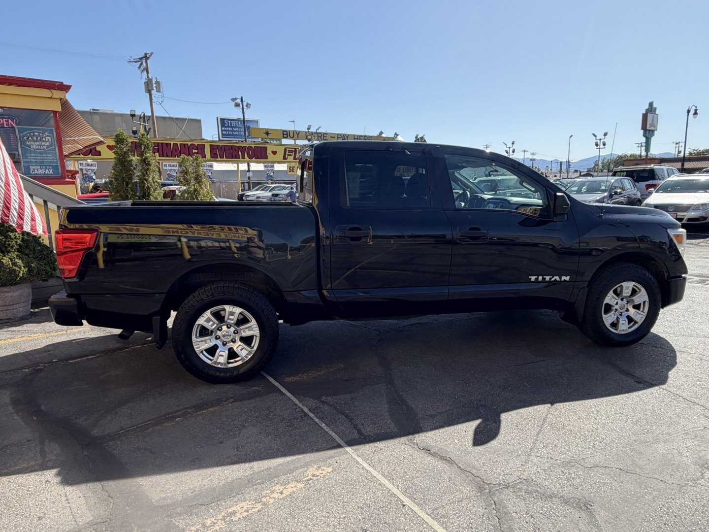 2017 Black /Black Nissan Titan S Crew Cab 4WD (1N6AA1EJ4HN) with an 5.6L V8 DOHC 32V engine, 6A transmission, located at 801 South State Street, Salt Lake City, UT, 84111, (801) 328-0098, 40.751953, -111.888206 - Clean title! Only 2 previous owners reported on the Carfax history report! This is a must see for anyone looking for a nice truck! Approved for up to a 5 year extended warranty! Come in today or call 801-328-0098 to schedule an appointment to take a look at it! Features: 4WD/AWD, ABS Brakes, Air C - Photo#8