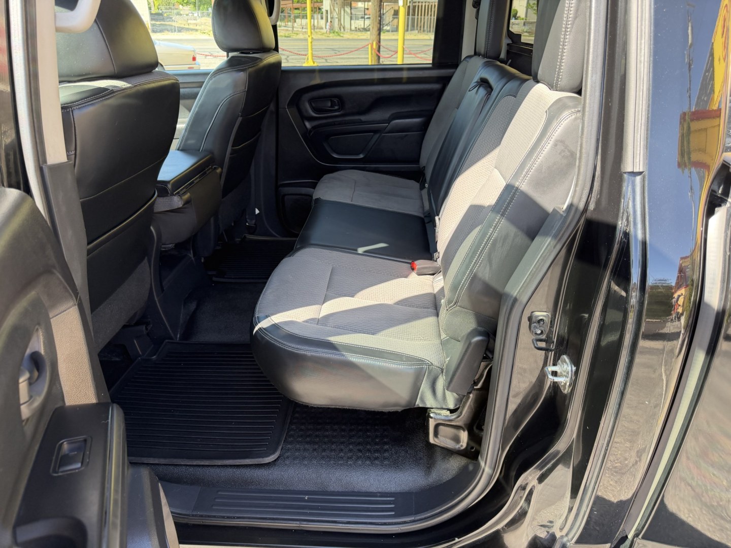 2017 Black /Black Nissan Titan S Crew Cab 4WD (1N6AA1EJ4HN) with an 5.6L V8 DOHC 32V engine, 6A transmission, located at 801 South State Street, Salt Lake City, UT, 84111, (801) 328-0098, 40.751953, -111.888206 - Clean title! Only 2 previous owners reported on the Carfax history report! This is a must see for anyone looking for a nice truck! Approved for up to a 5 year extended warranty! Come in today or call 801-328-0098 to schedule an appointment to take a look at it! Features: 4WD/AWD, ABS Brakes, Air C - Photo#21