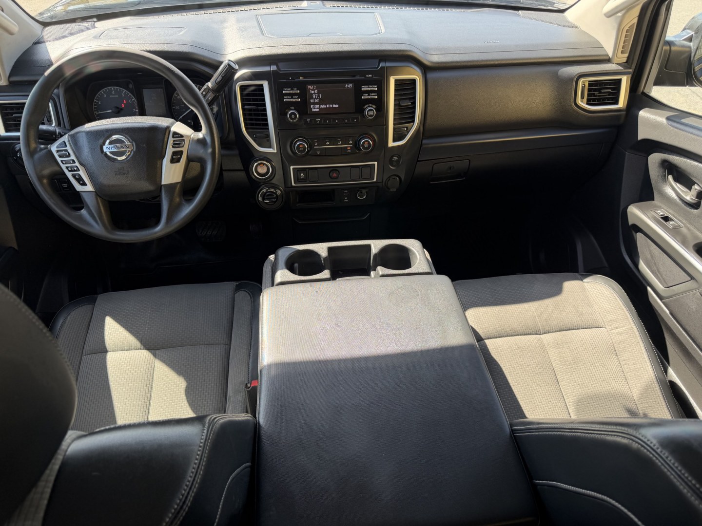2017 Black /Black Nissan Titan S Crew Cab 4WD (1N6AA1EJ4HN) with an 5.6L V8 DOHC 32V engine, 6A transmission, located at 801 South State Street, Salt Lake City, UT, 84111, (801) 328-0098, 40.751953, -111.888206 - Clean title! Only 2 previous owners reported on the Carfax history report! This is a must see for anyone looking for a nice truck! Approved for up to a 5 year extended warranty! Come in today or call 801-328-0098 to schedule an appointment to take a look at it! Features: 4WD/AWD, ABS Brakes, Air C - Photo#13