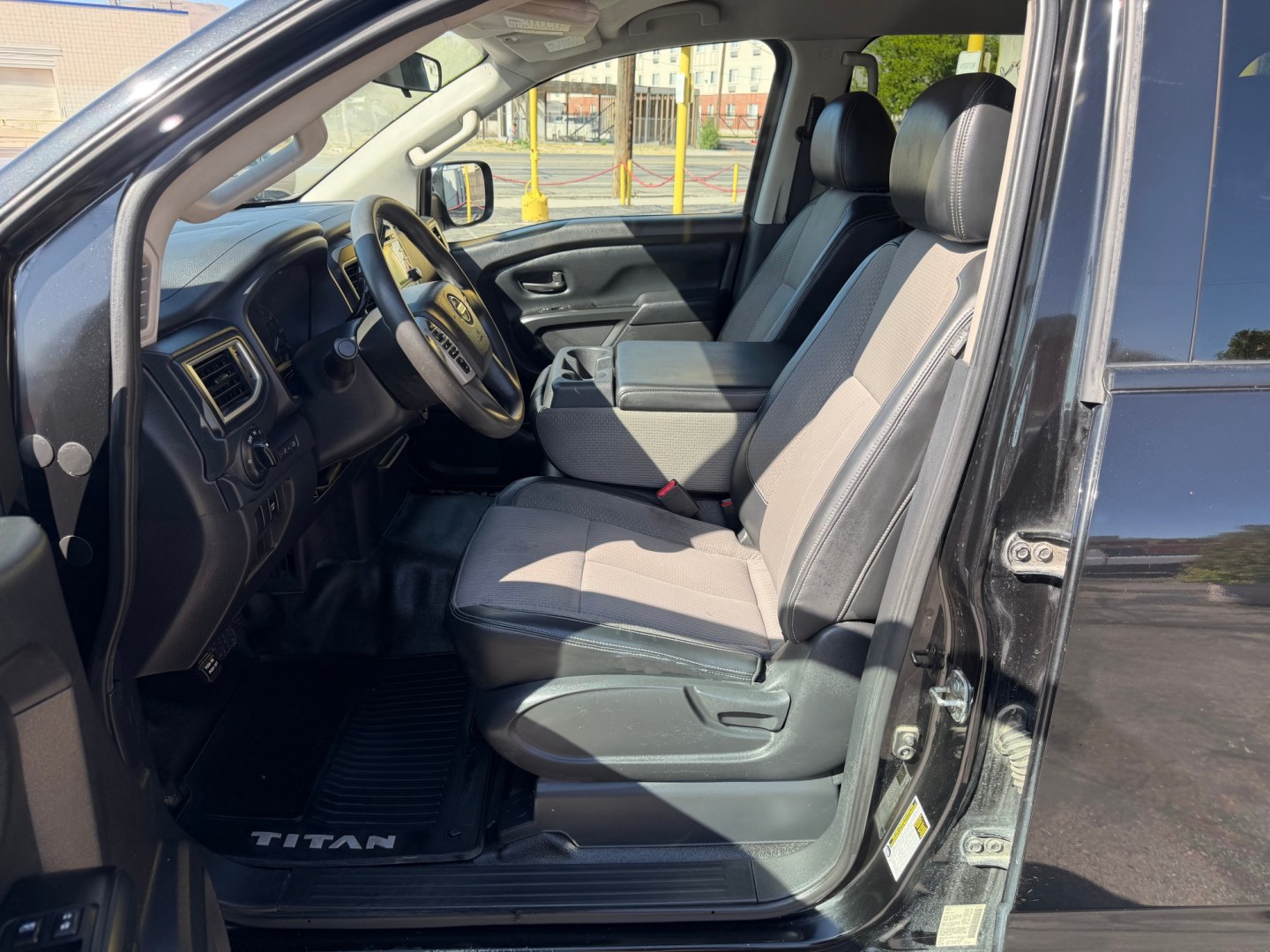 2017 Black /Black Nissan Titan S Crew Cab 4WD (1N6AA1EJ4HN) with an 5.6L V8 DOHC 32V engine, 6A transmission, located at 801 South State Street, Salt Lake City, UT, 84111, (801) 328-0098, 40.751953, -111.888206 - Clean title! Only 2 previous owners reported on the Carfax history report! This is a must see for anyone looking for a nice truck! Approved for up to a 5 year extended warranty! Come in today or call 801-328-0098 to schedule an appointment to take a look at it! Features: 4WD/AWD, ABS Brakes, Air C - Photo#20