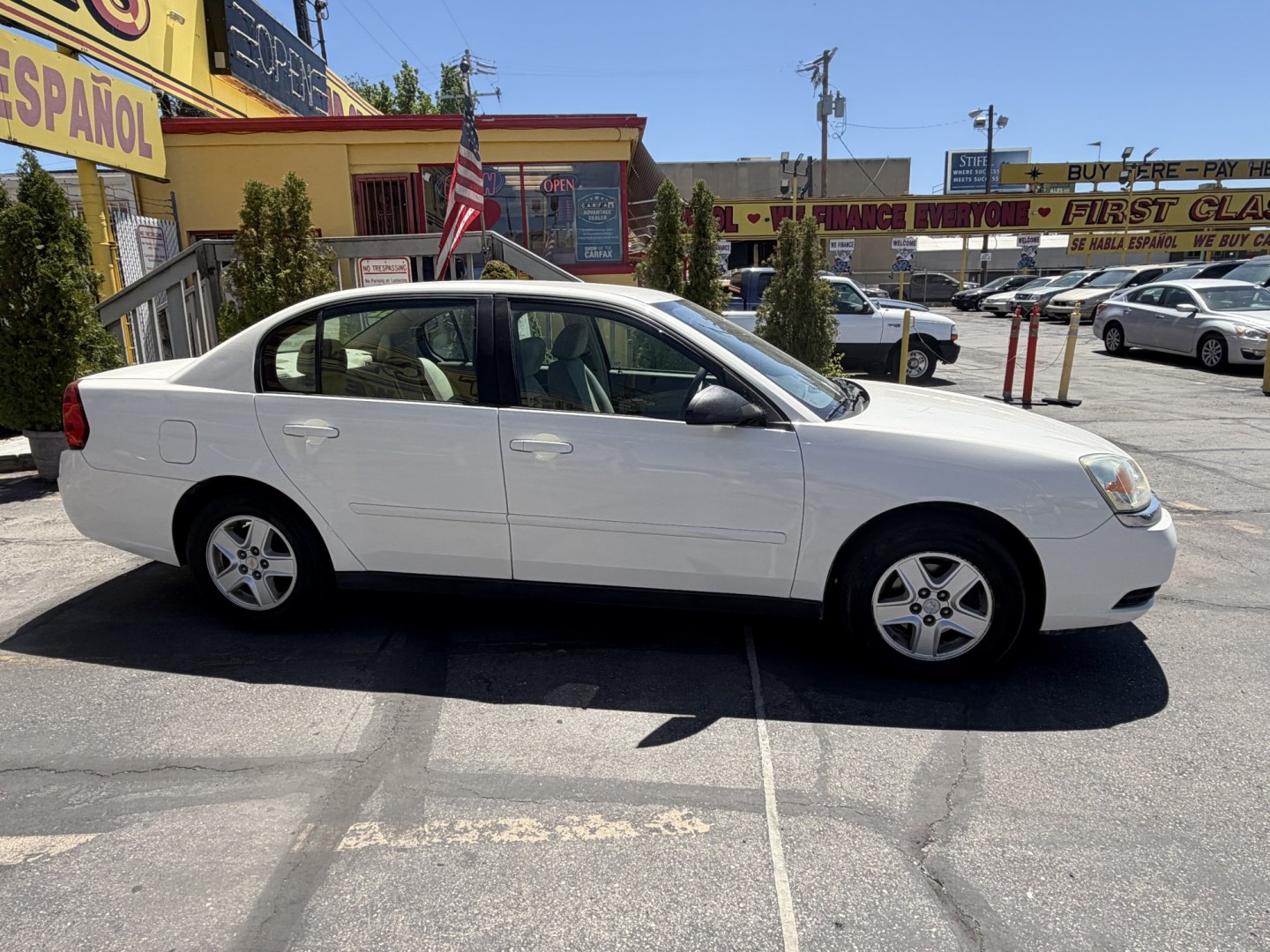 2004 Super White /Tan Chevrolet Malibu LS (1G1ZT528X4F) with an 3.5L V6 OHV 12V engine, 4-Speed Automatic Overdrive transmission, located at 801 South State Street, Salt Lake City, UT, 84111, (801) 328-0098, 40.751953, -111.888206 - Clean title! No reported accidents on Carfax history report! Approved for up to a 5 year warranty that can be added at time of purchase! Passed all inspections and ready for sale! Good reliable affordable transportation to go from point a to point b! Features: ABS Brakes, Air Conditioning, Alloy W - Photo#6
