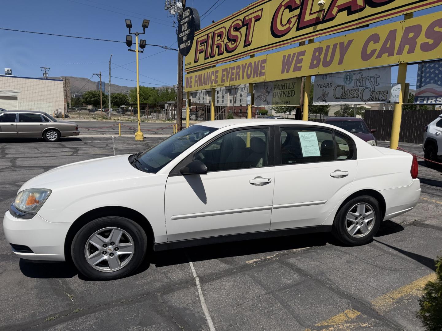 2004 Super White /Tan Chevrolet Malibu LS (1G1ZT528X4F) with an 3.5L V6 OHV 12V engine, 4-Speed Automatic Overdrive transmission, located at 801 South State Street, Salt Lake City, UT, 84111, (801) 328-0098, 40.751953, -111.888206 - Clean title! No reported accidents on Carfax history report! Approved for up to a 5 year warranty that can be added at time of purchase! Passed all inspections and ready for sale! Good reliable affordable transportation to go from point a to point b! Features: ABS Brakes, Air Conditioning, Alloy W - Photo#12