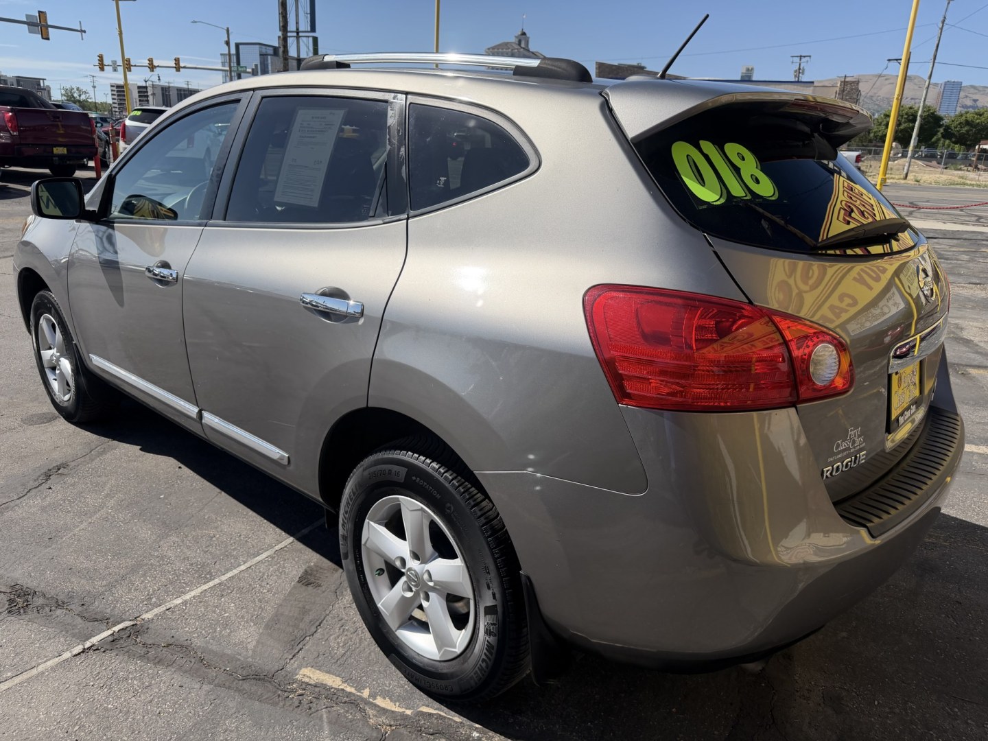 2012 Naples Gold Metallic /Black Nissan Rogue S AWD (JN8AS5MV8CW) with an 2.5L L4 DOHC 16V engine, Continuously Variable Transmission transmission, located at 801 South State Street, Salt Lake City, UT, 84111, (801) 328-0098, 40.751953, -111.888206 - Clean title! No accidents on Carfax! SUV has been maintained Carfax shows regular service and oil changes were done. Approved for up to a 5 year warranty that can be added. Passed all mechanical certifications and inspections and has been approved for an extended warranty. Features: 4WD/AWD, ABS B - Photo#7