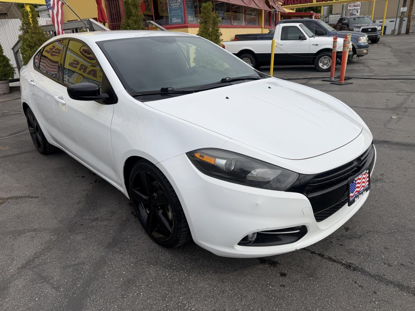 2014 Super White /Black Dodge Dart SXT (1C3CDFBB7ED) with an 2.4L L4 DOHC 16V engine, Automatic transmission, located at 801 South State Street, Salt Lake City, UT, 84111, (801) 328-0098, 40.751953, -111.888206 - Low Miles! Clean title! Affordable transportation with low mileage! Approved for up to a 5 year warranty that can be added at time of purchase. This one is a must see! Very nice! Great gas mileage! Features: ABS Brakes, Air Conditioning, Alloy Wheels, AM/FM Stereo, Automatic Transmission, Auxiliar - Photo#3
