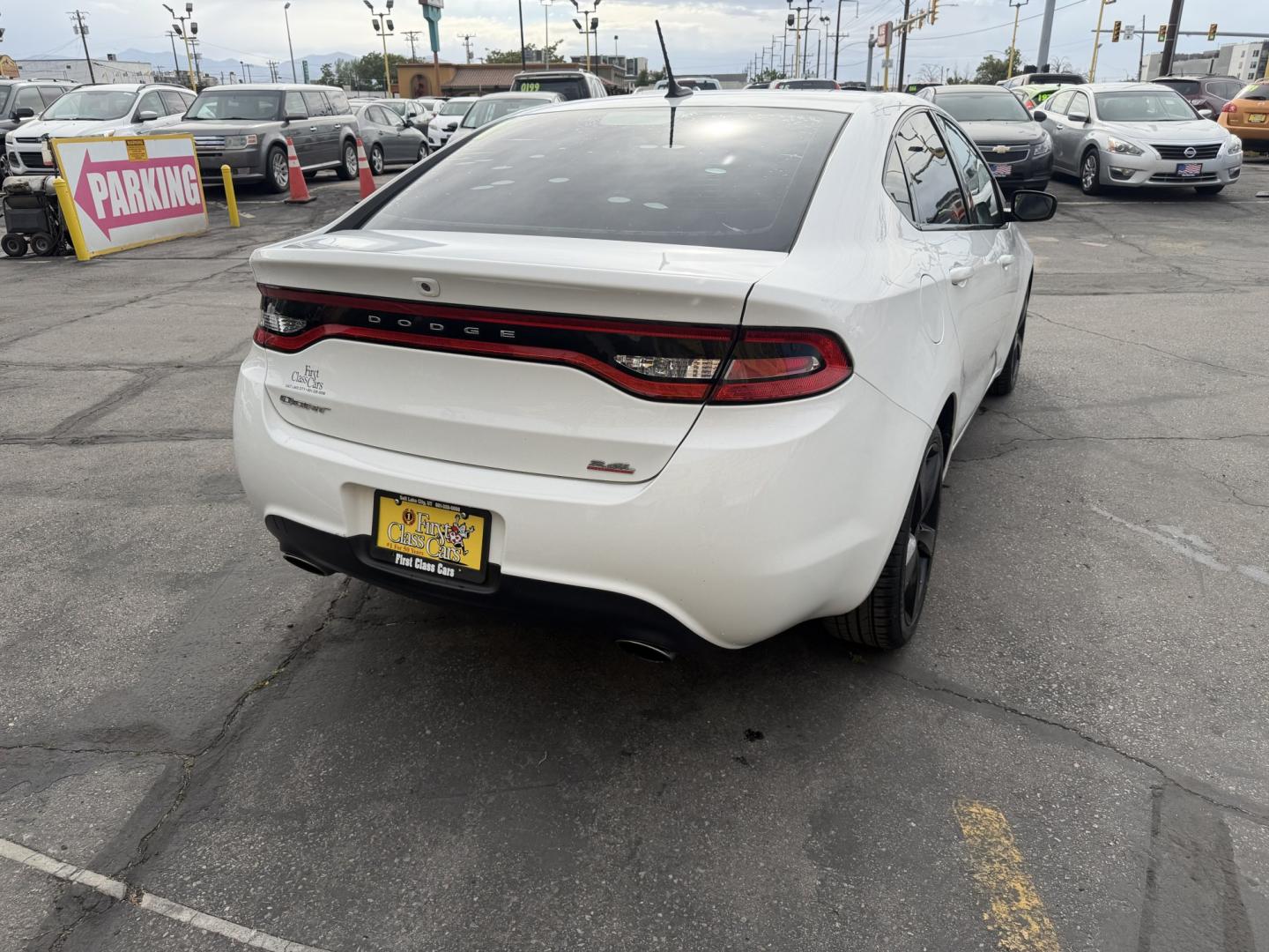 2014 Super White /Black Dodge Dart SXT (1C3CDFBB7ED) with an 2.4L L4 DOHC 16V engine, Automatic transmission, located at 801 South State Street, Salt Lake City, UT, 84111, (801) 328-0098, 40.751953, -111.888206 - Low Miles! Clean title! Affordable transportation with low mileage! Approved for up to a 5 year warranty that can be added at time of purchase. This one is a must see! Very nice! Great gas mileage! Features: ABS Brakes, Air Conditioning, Alloy Wheels, AM/FM Stereo, Automatic Transmission, Auxiliar - Photo#7