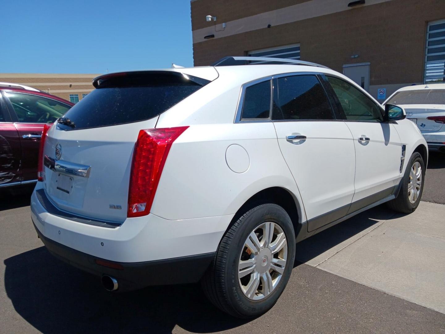 2012 Artic White /Tan Cadillac SRX Luxury (3GYFNAE37CS) with an 3.6L V6 DOHC 24V FFV engine, 6-Speed Automatic transmission, located at 801 South State Street, Salt Lake City, UT, 84111, (801) 328-0098, 40.751953, -111.888206 - Clean title! Hard to find! In great shape has passed all inspections and emissions and approved for up to a 5 year warranty that can be added onto the vehicle! Nice Cadillac in excellent condition for the year, make and miles. This is a must see for anyone looking for a clean Cadillac! Call 801-328- - Photo#2