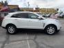 2012 Artic White /Tan Cadillac SRX Luxury (3GYFNAE37CS) with an 3.6L V6 DOHC 24V FFV engine, 6-Speed Automatic transmission, located at 801 South State Street, Salt Lake City, UT, 84111, (801) 328-0098, 40.751953, -111.888206 - Clean title! Hard to find! In great shape has passed all inspections and emissions and approved for up to a 5 year warranty that can be added onto the vehicle! Nice Cadillac in excellent condition for the year, make and miles. This is a must see for anyone looking for a clean Cadillac! Call 801-328- - Photo#4