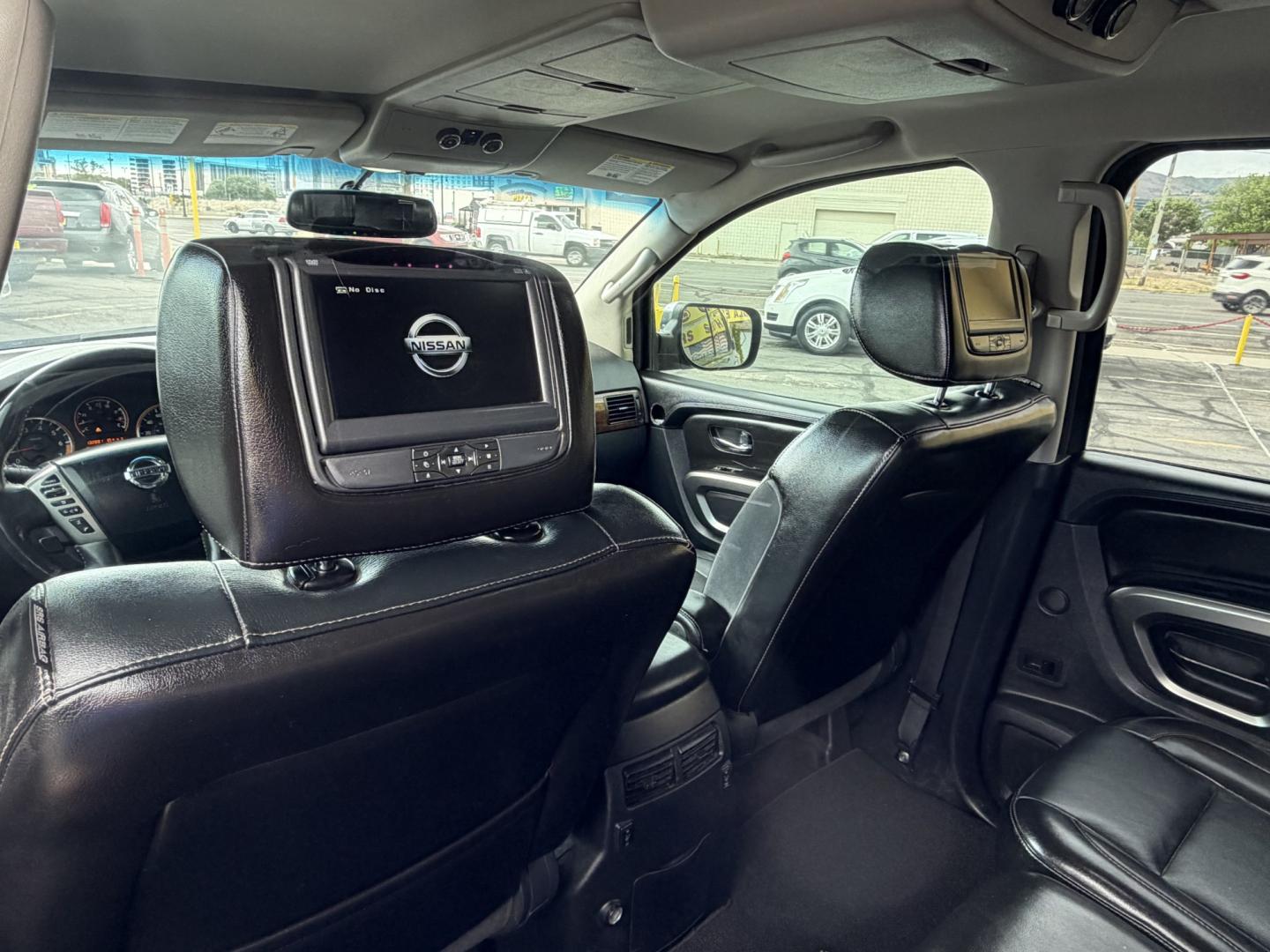 2015 Black /Black Nissan Armada SL 4WD (5N1BA0NC3FN) with an 5.6L V8 DOHC 32V FFV engine, 5-Speed Automatic transmission, located at 801 South State Street, Salt Lake City, UT, 84111, (801) 328-0098, 40.751953, -111.888206 - Immaculate inside and out! Super Clean! Clean Title no accidents! Must see for anyone looking for a clean Armada with 4x4. Approved for up to a 5 year warranty that can be added onto the vehicle at time of sale. Passed all emissions and has been inspected by a certified mechanic and approved for up - Photo#17