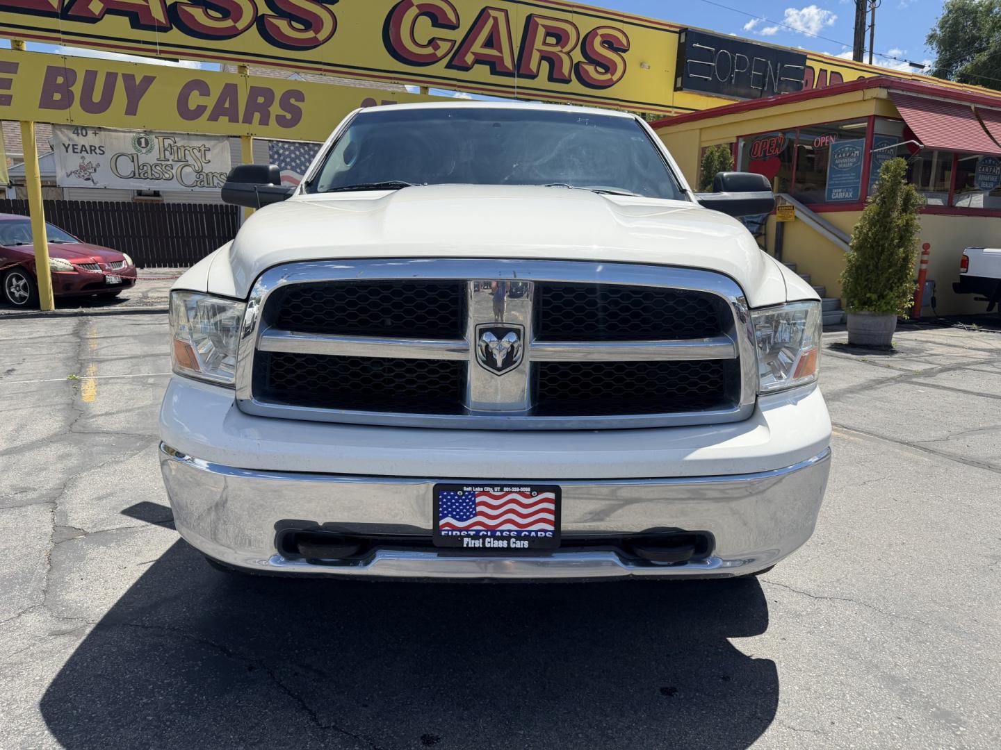2009 Super White /Tan Dodge Ram 1500 SLT Crew Cab 4WD (1D3HV13P49S) with an 4.7L V8 SOHC 16V FFV engine, 5-Speed Automatic transmission, located at 801 South State Street, Salt Lake City, UT, 84111, (801) 328-0098, 40.751953, -111.888206 - Seats up to 6 People! Folding Armrest! Clean Title! Clean Carfax! Carfax shows regular service was performed and maintained. Nice affordable 4x4 truck great summer time truck for towing or winter truck for 4x4 as well! Passed all inspections already by a certified mechanic and has been approved for - Photo#2