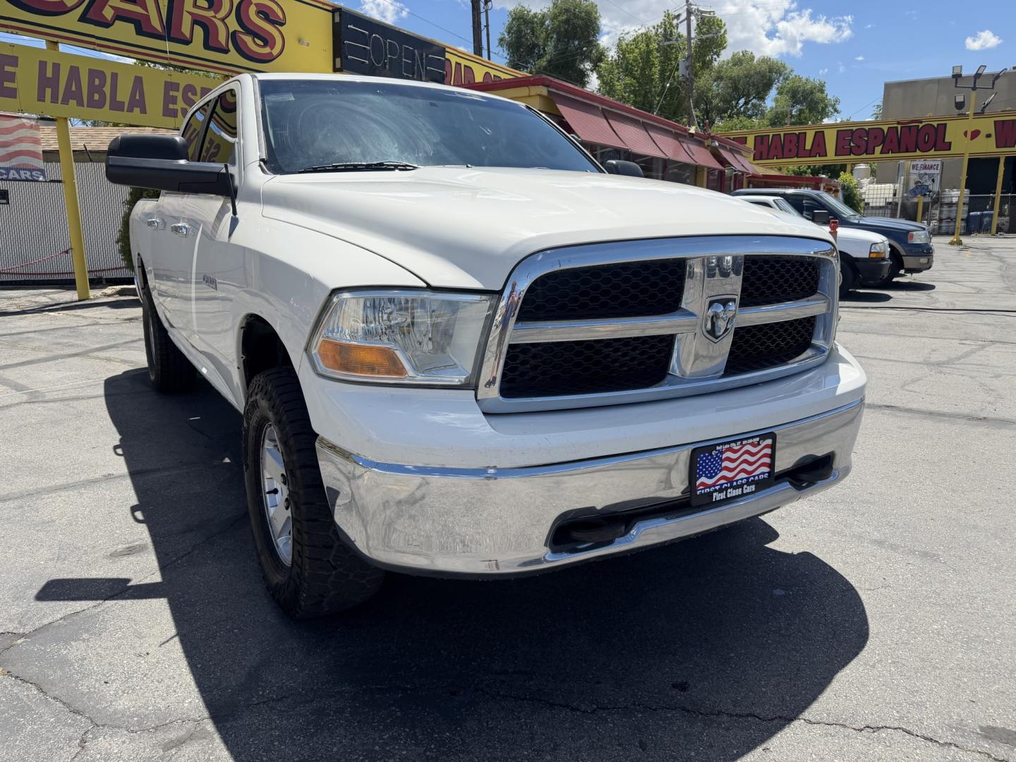 2009 Super White /Tan Dodge Ram 1500 SLT Crew Cab 4WD (1D3HV13P49S) with an 4.7L V8 SOHC 16V FFV engine, 5-Speed Automatic transmission, located at 801 South State Street, Salt Lake City, UT, 84111, (801) 328-0098, 40.751953, -111.888206 - Seats up to 6 People! Folding Armrest! Clean Title! Clean Carfax! Carfax shows regular service was performed and maintained. Nice affordable 4x4 truck great summer time truck for towing or winter truck for 4x4 as well! Passed all inspections already by a certified mechanic and has been approved for - Photo#3