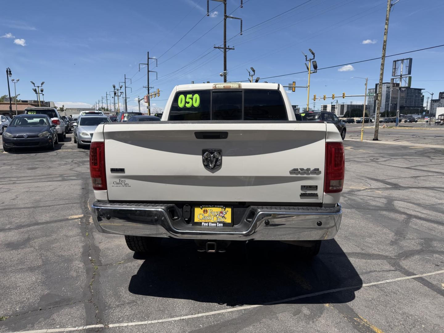 2009 Super White /Tan Dodge Ram 1500 SLT Crew Cab 4WD (1D3HV13P49S) with an 4.7L V8 SOHC 16V FFV engine, 5-Speed Automatic transmission, located at 801 South State Street, Salt Lake City, UT, 84111, (801) 328-0098, 40.751953, -111.888206 - Seats up to 6 People! Folding Armrest! Clean Title! Clean Carfax! Carfax shows regular service was performed and maintained. Nice affordable 4x4 truck great summer time truck for towing or winter truck for 4x4 as well! Passed all inspections already by a certified mechanic and has been approved for - Photo#9